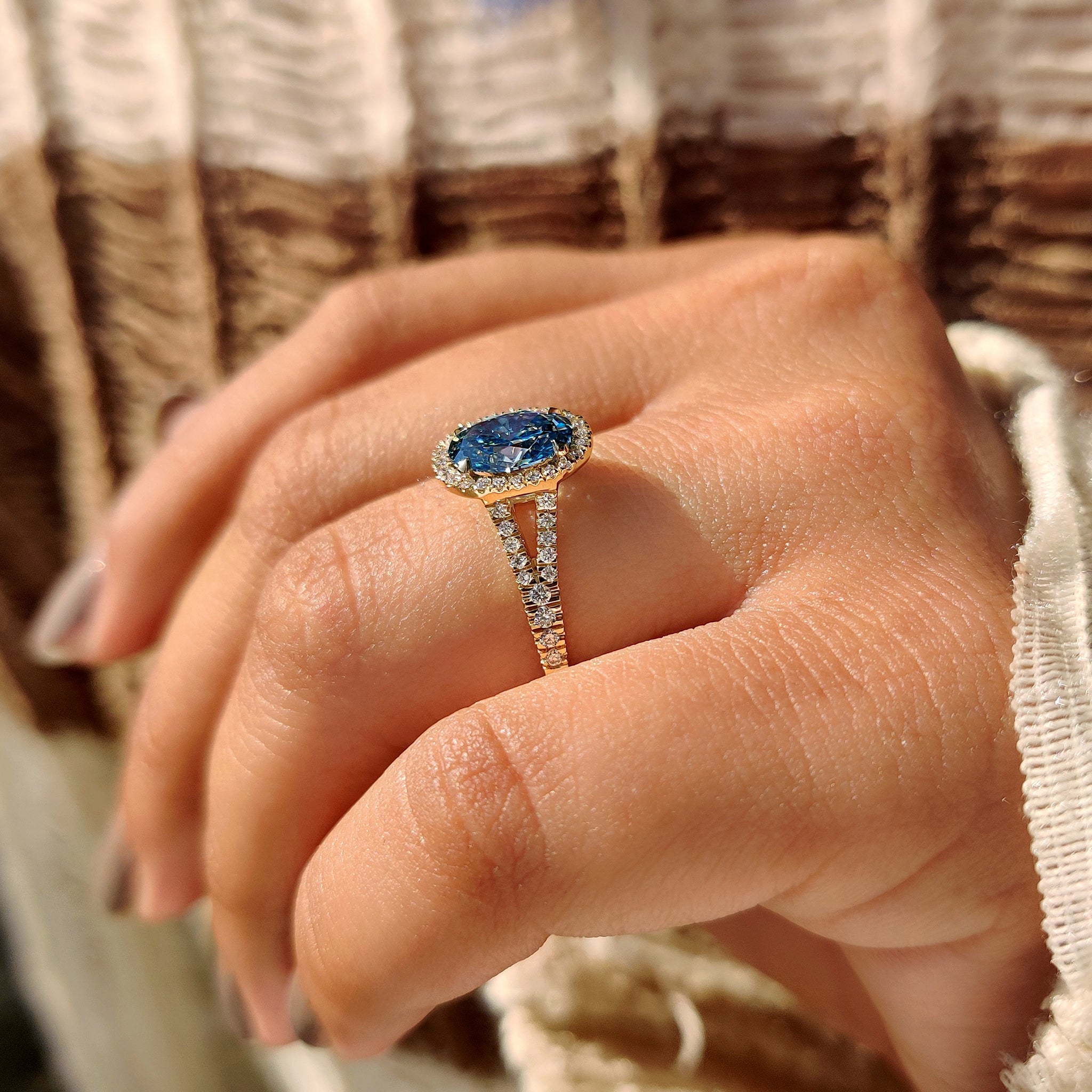 Lab grown diamond oval engagement ring with four claw prong.
