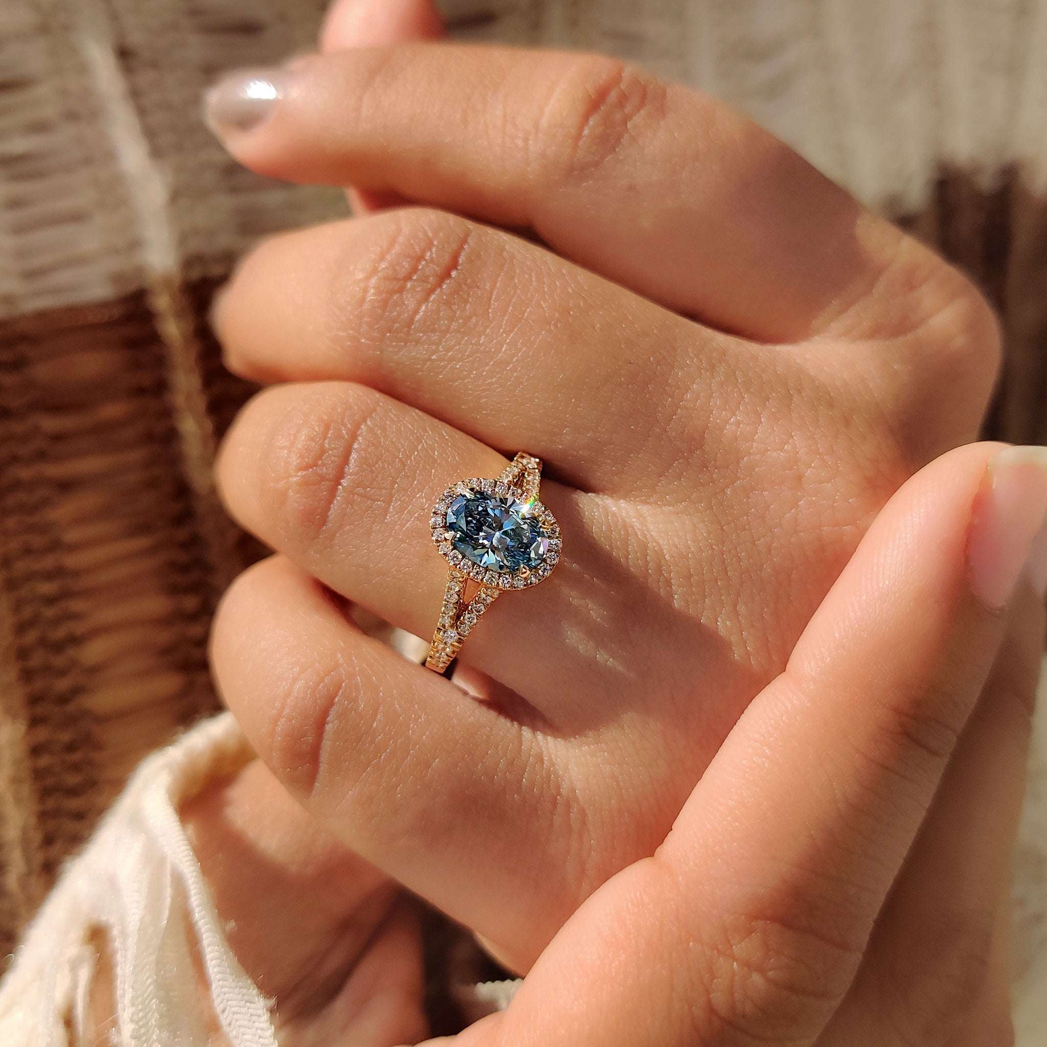 Lab grown diamond oval engagement ring with cathedral setting.
