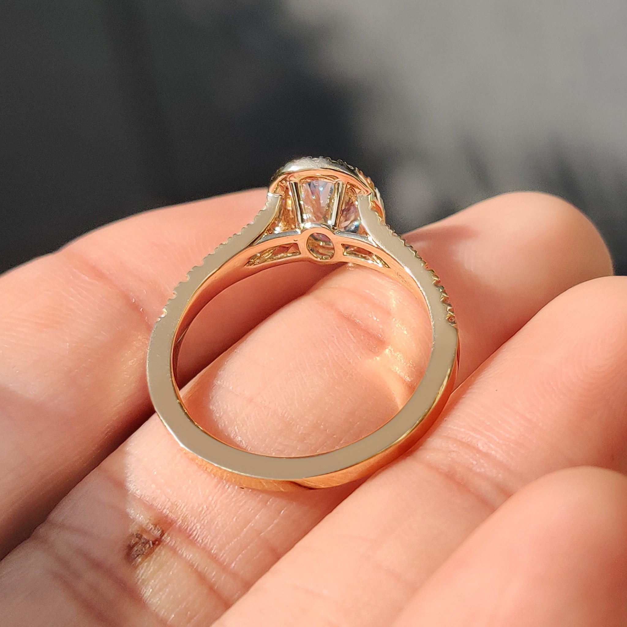 Handmade oval engagement ring with IGI certified blue diamond.
