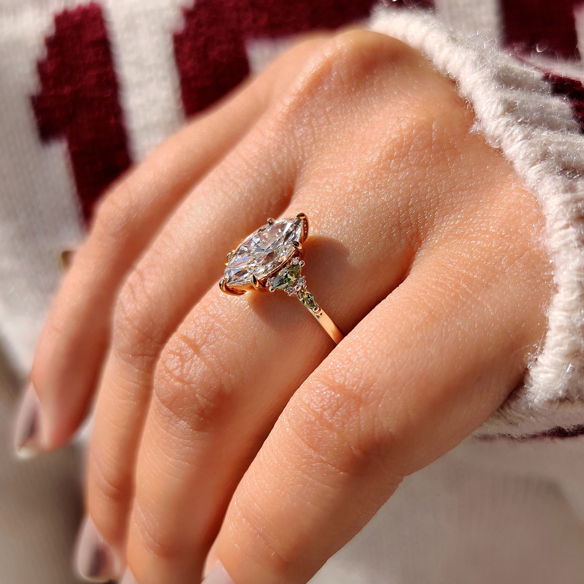 Marquise diamond ring with six claw prong setting.
