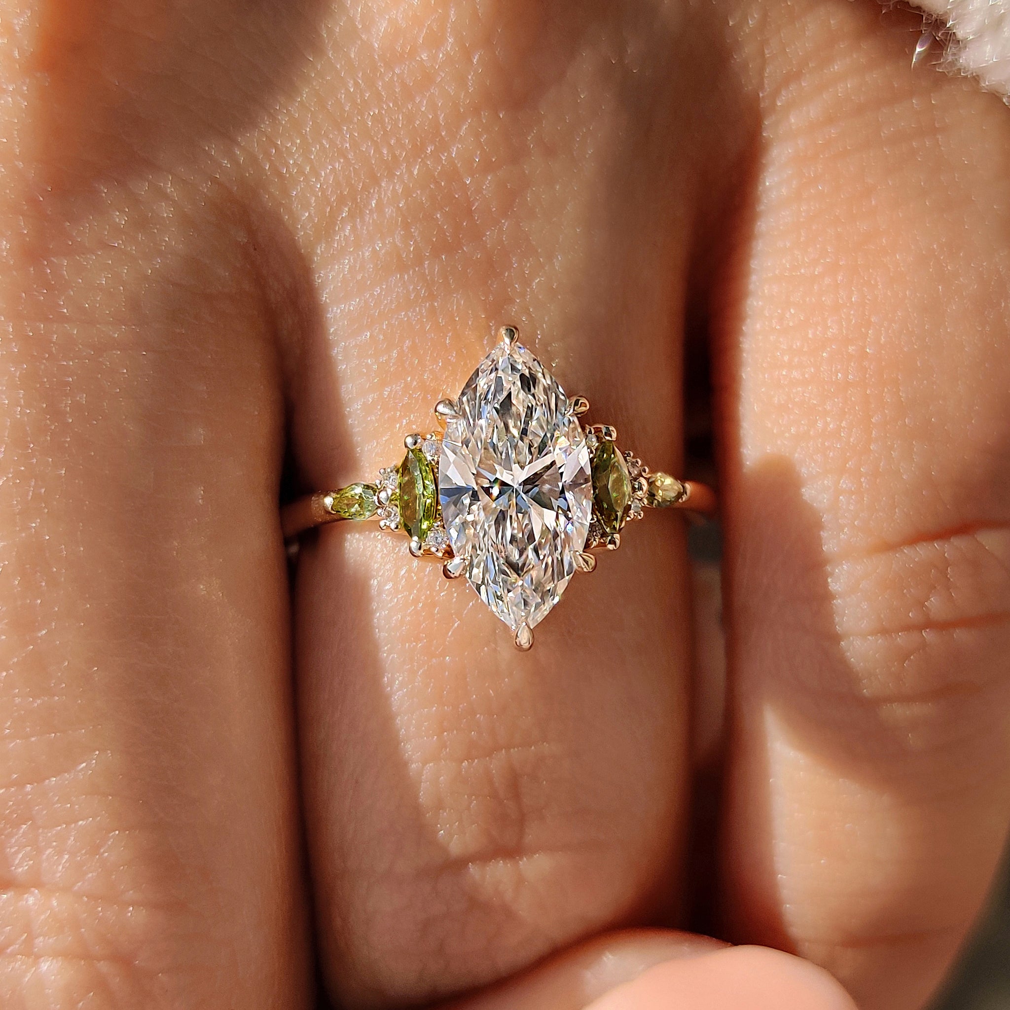 Handmade marquise diamond ring with muse setting detail.
