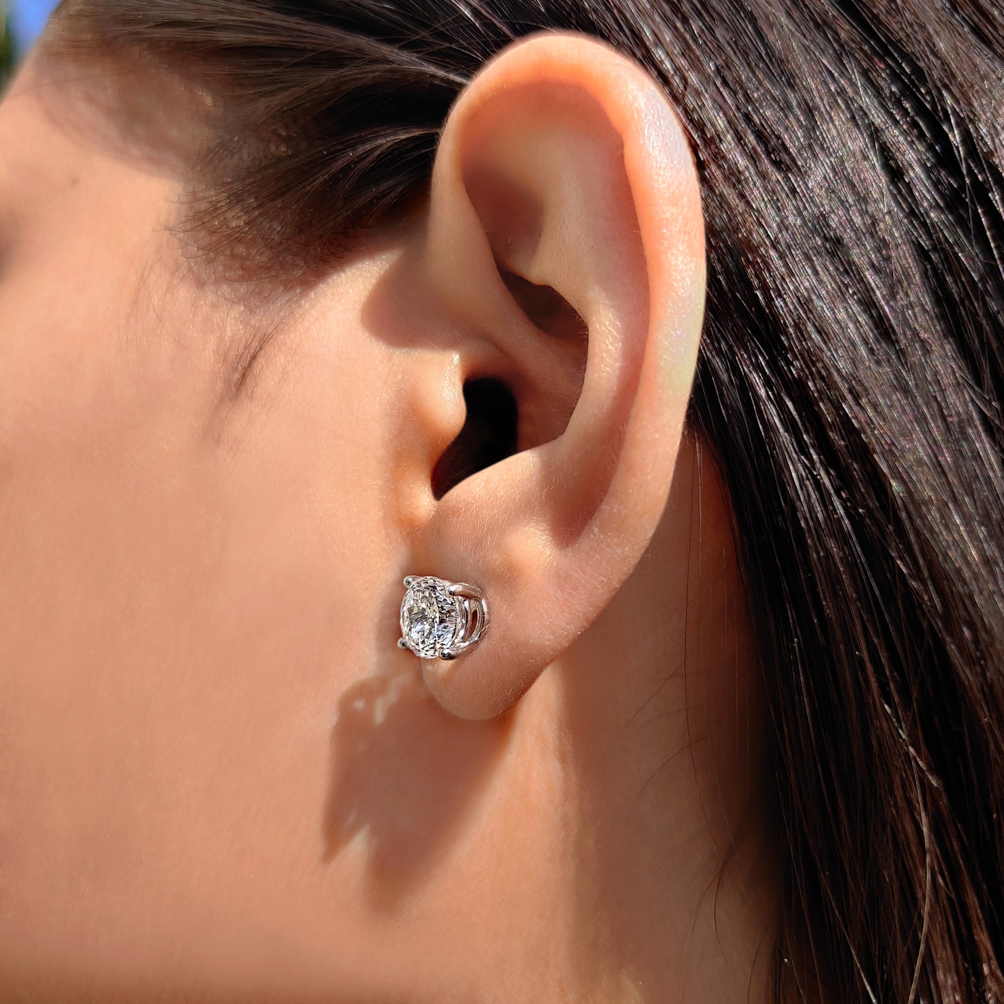 Four Prong Portuguese Cut Diamond Earrings.
