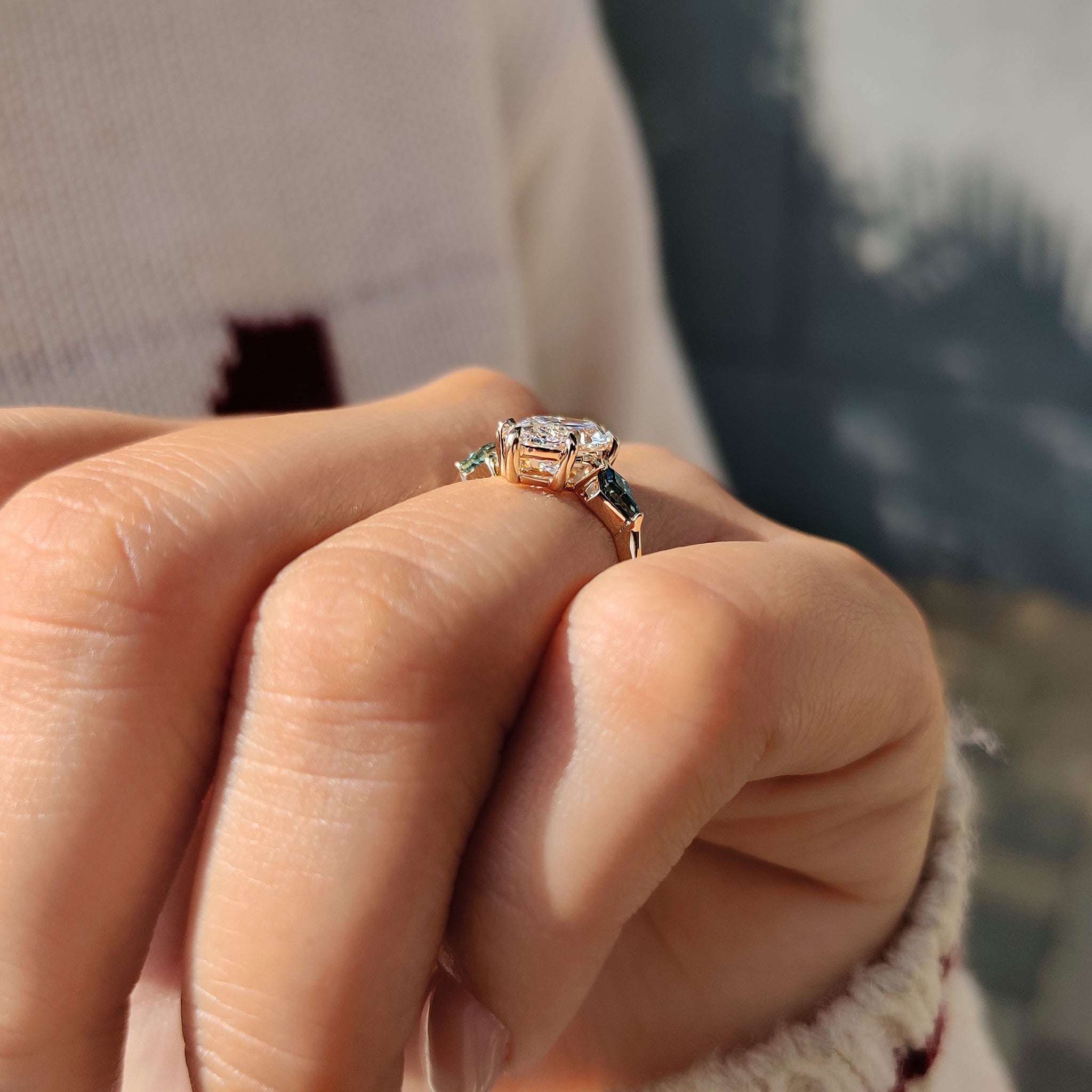 Three stone diamond ring with marquise and kite cuts.
