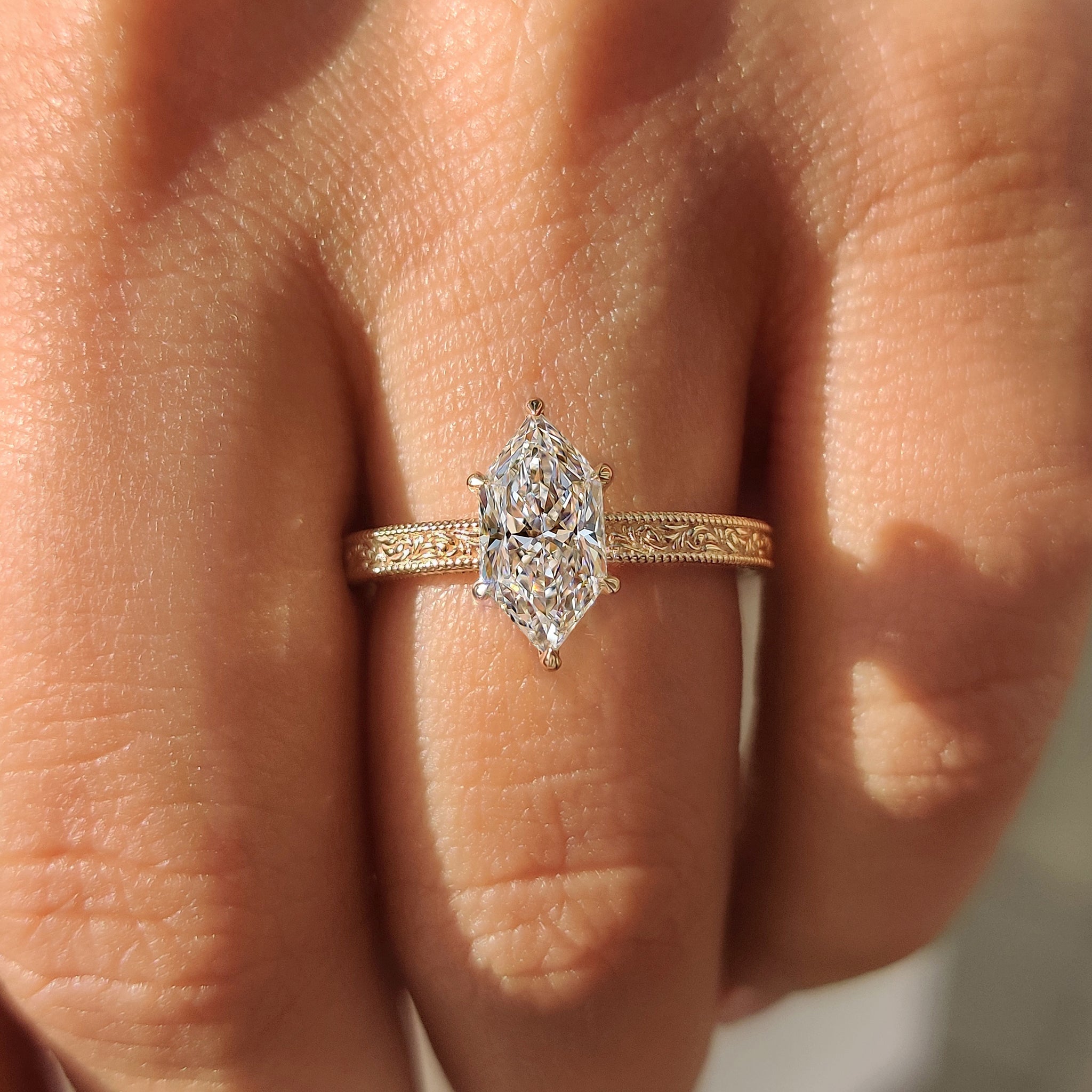 Dutch marquise ring with secure six claw prong style.
