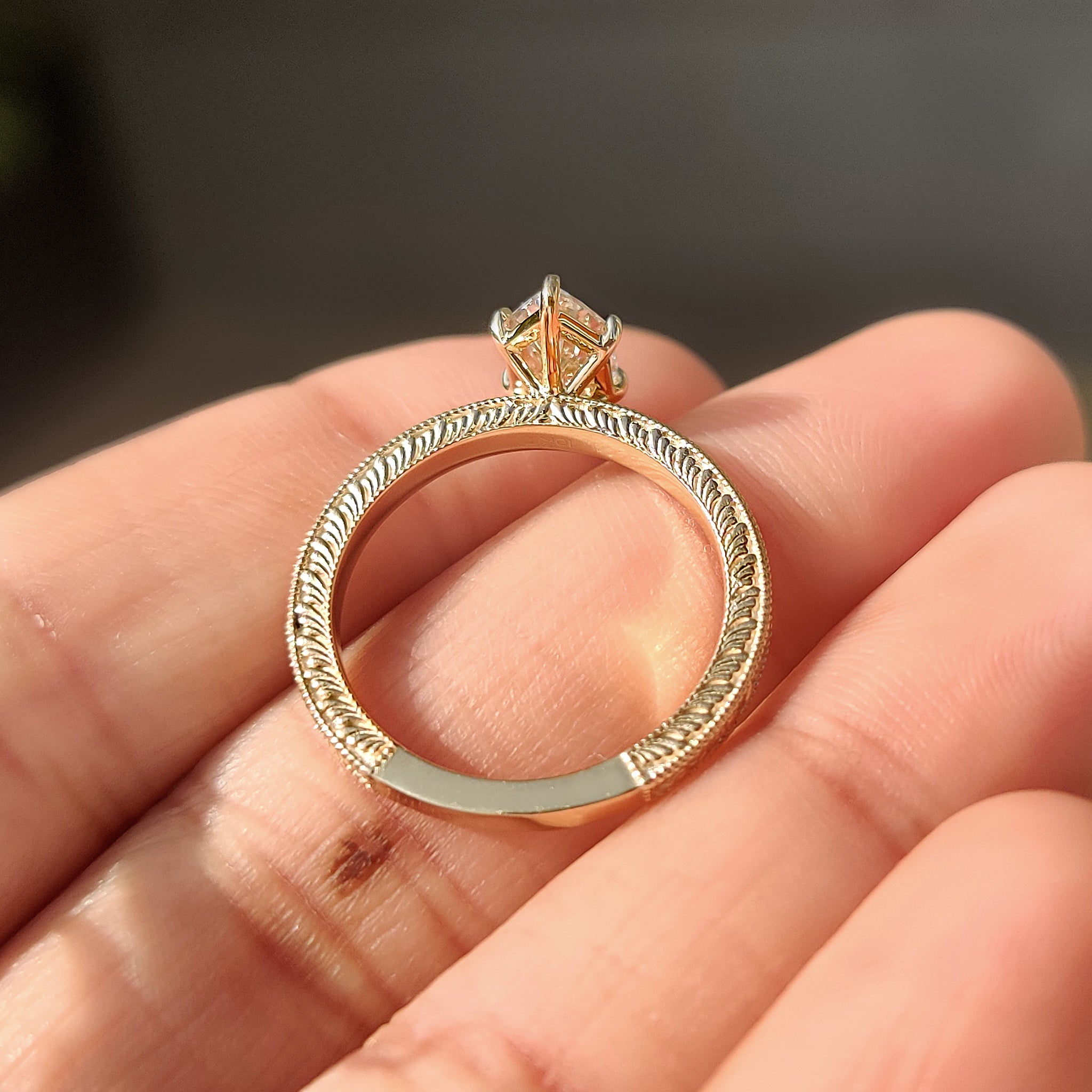 Carat diamonds dutch marquise ring with ocean waves pattern.
