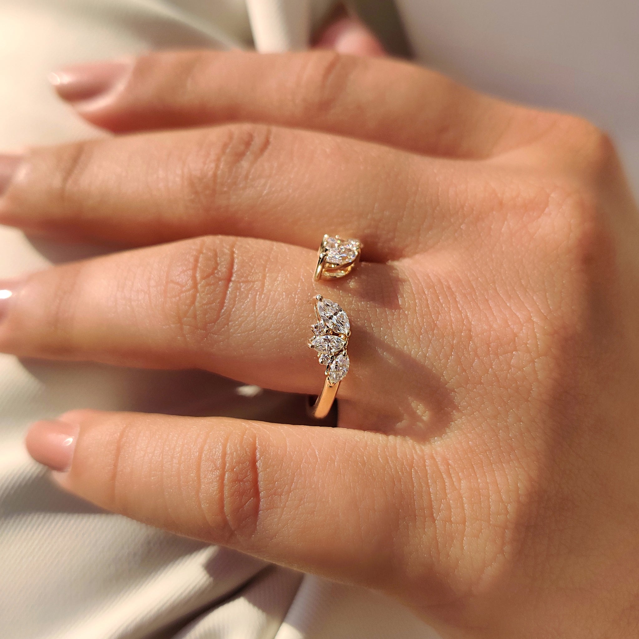 Open gap wedding band with round prong setting and lab grown diamond.
