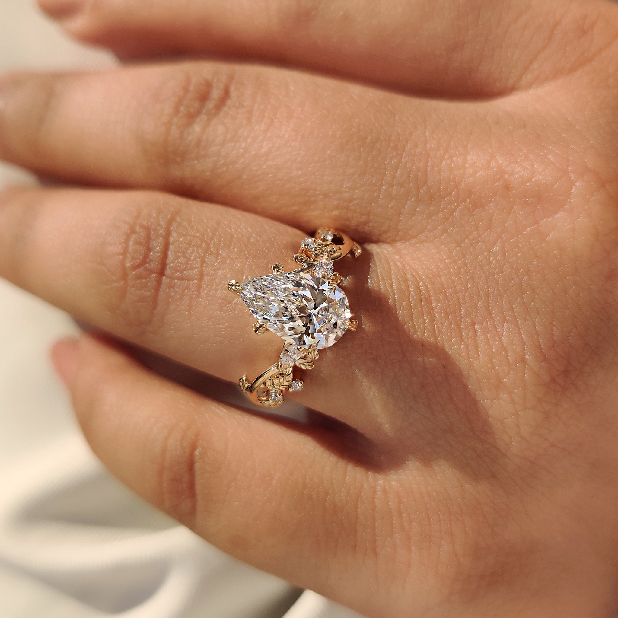 Pear diamond ring crafted as a custom diamond ring.

