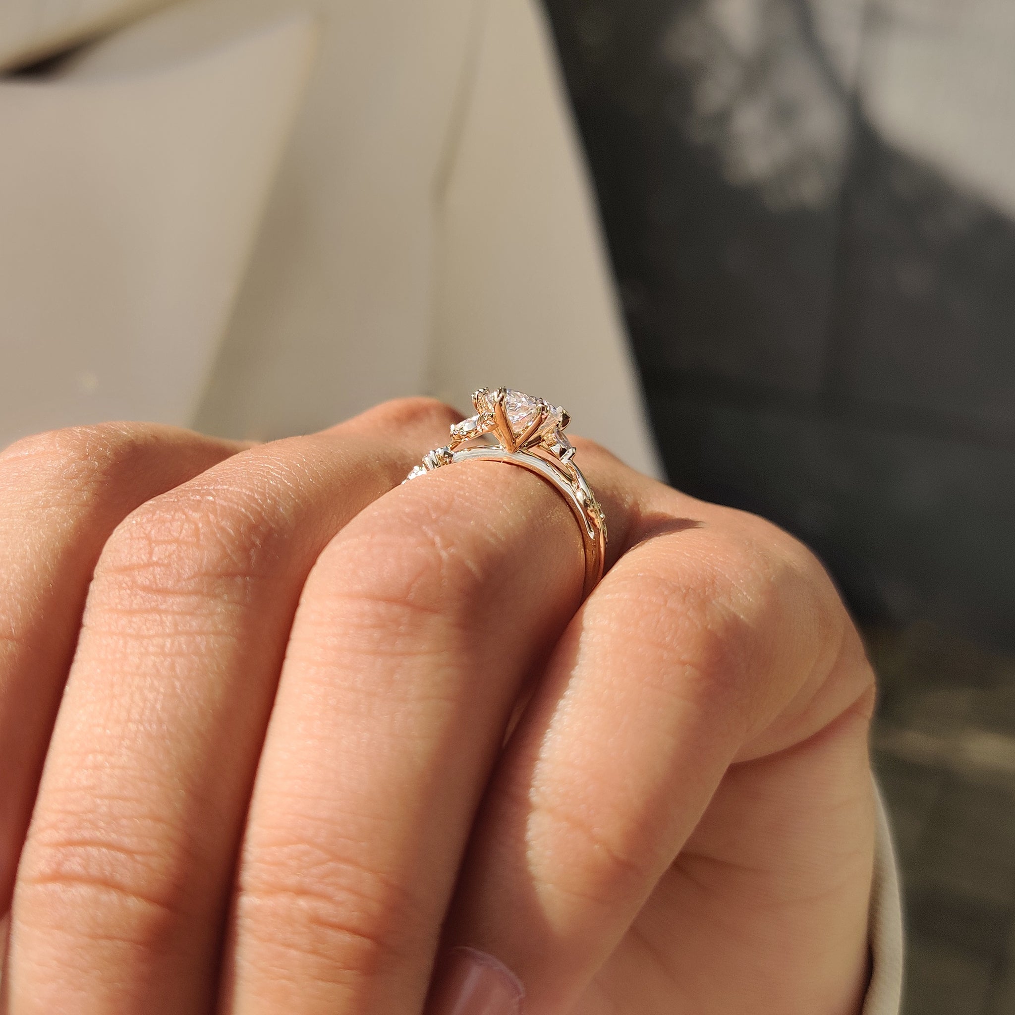 Lab grown diamond pear ring with detailed filigree work.
