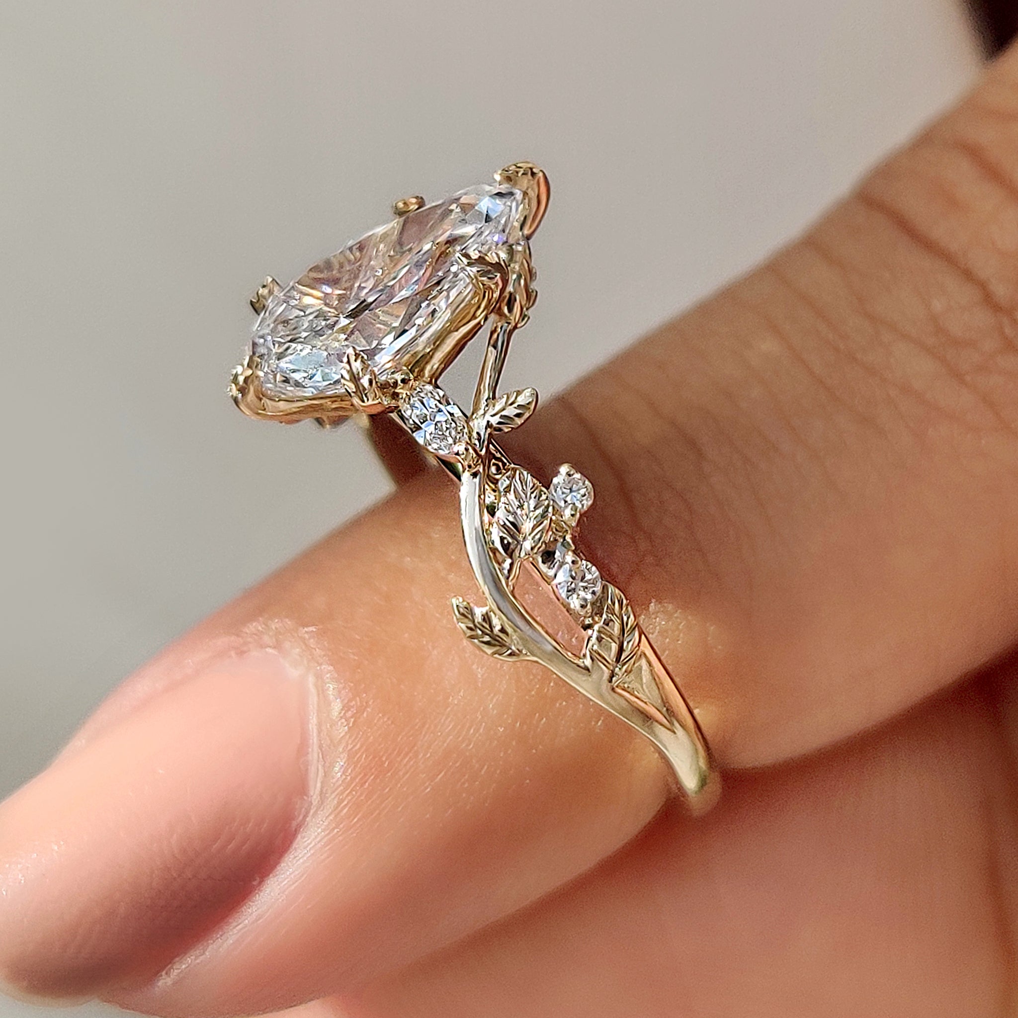 Carat diamonds engagement ring with filigree and nature details.
