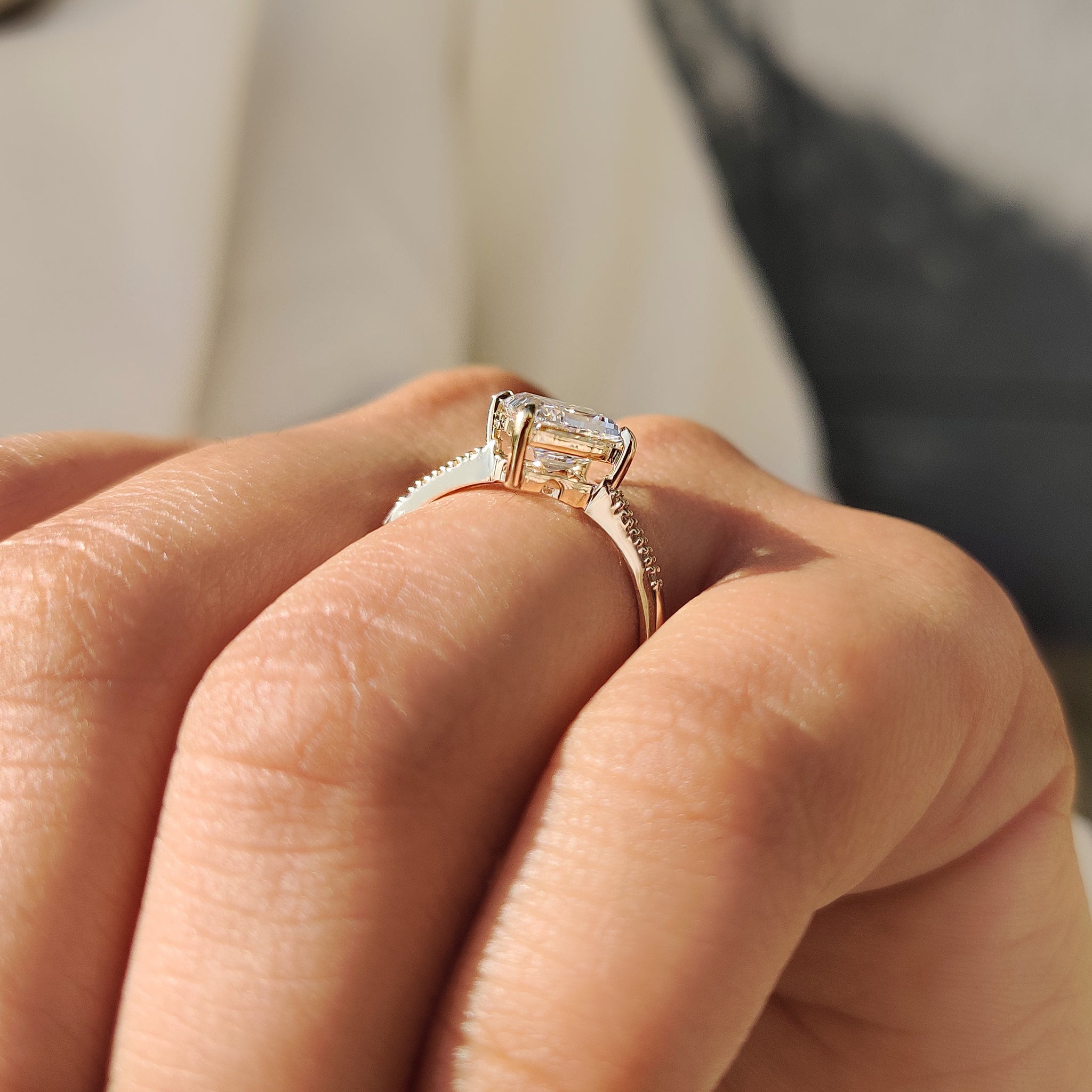 IGI certified lozenge cut diamond ring with pave band.
