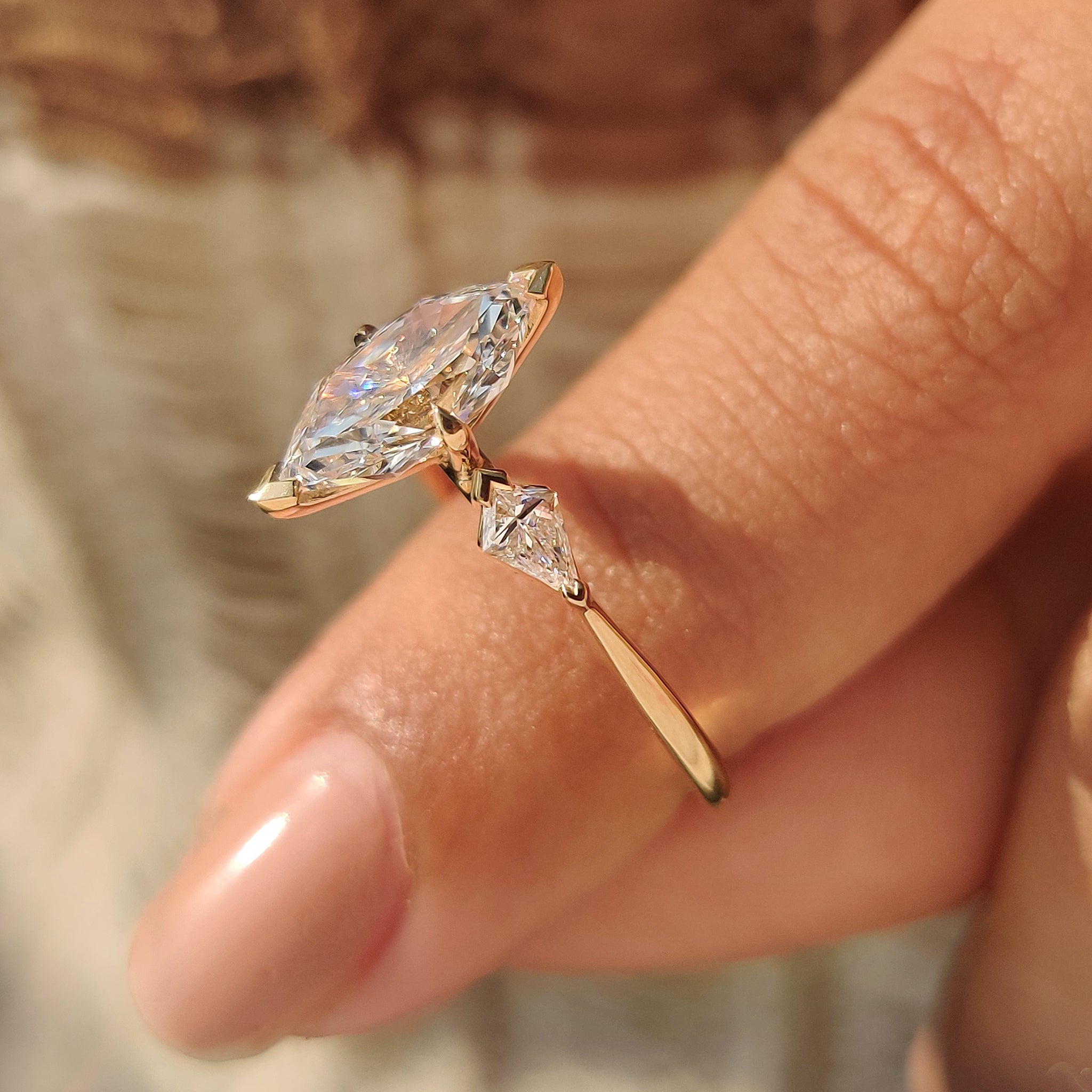 Handmade three diamond ring with dutch marquise and kite cut diamonds.

