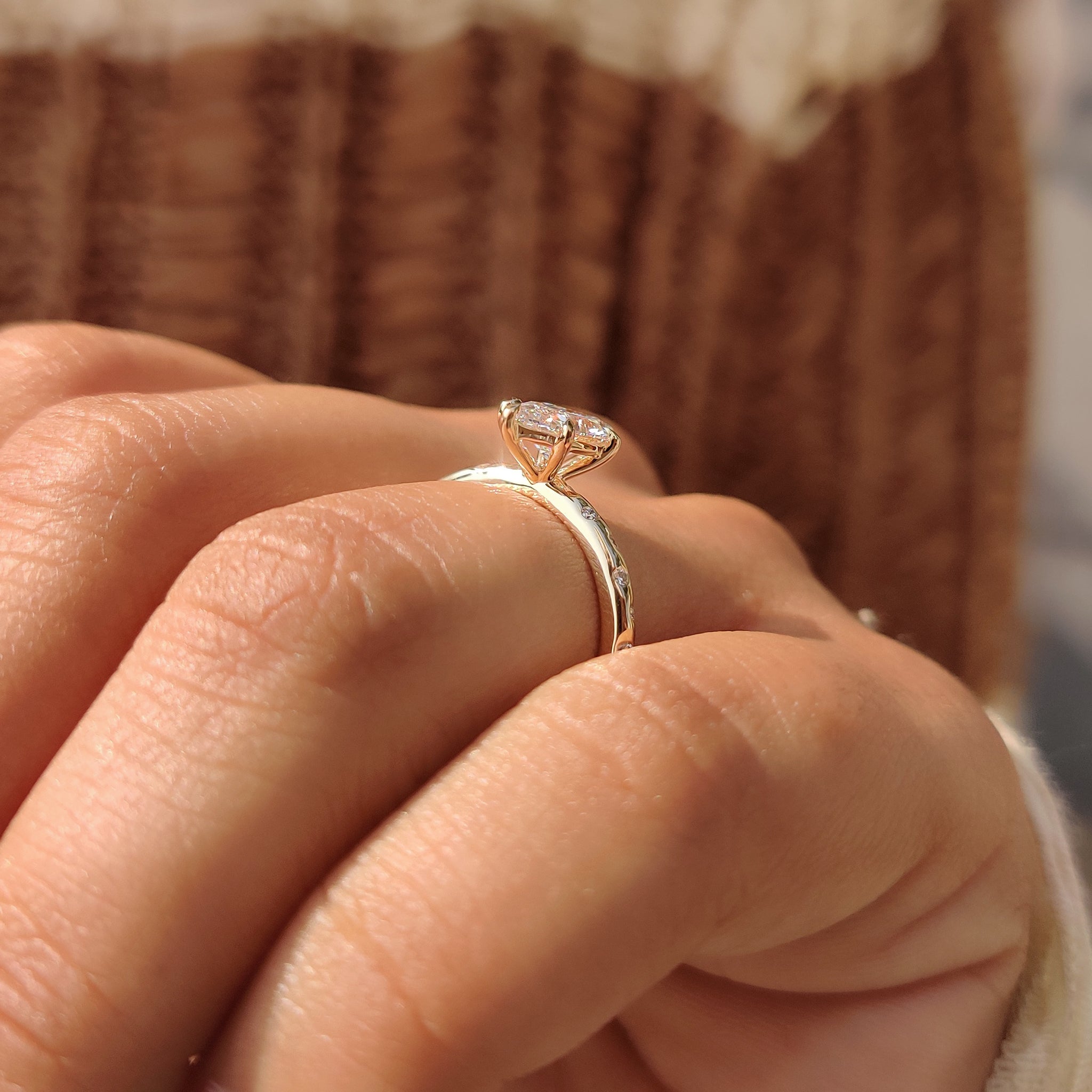 Carat diamonds ring with marquise diamond and flush pave setting.
