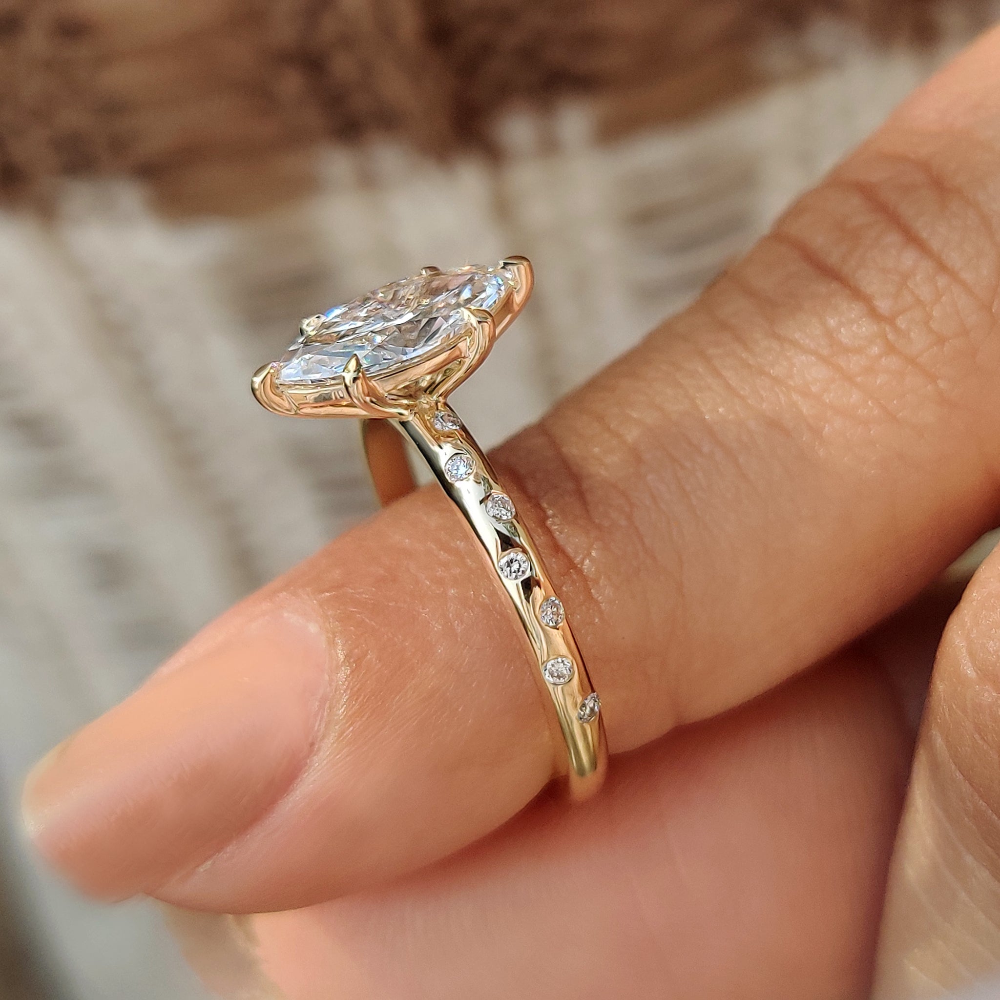 Handmade jewelry marquise diamond ring with flush pave setting.
