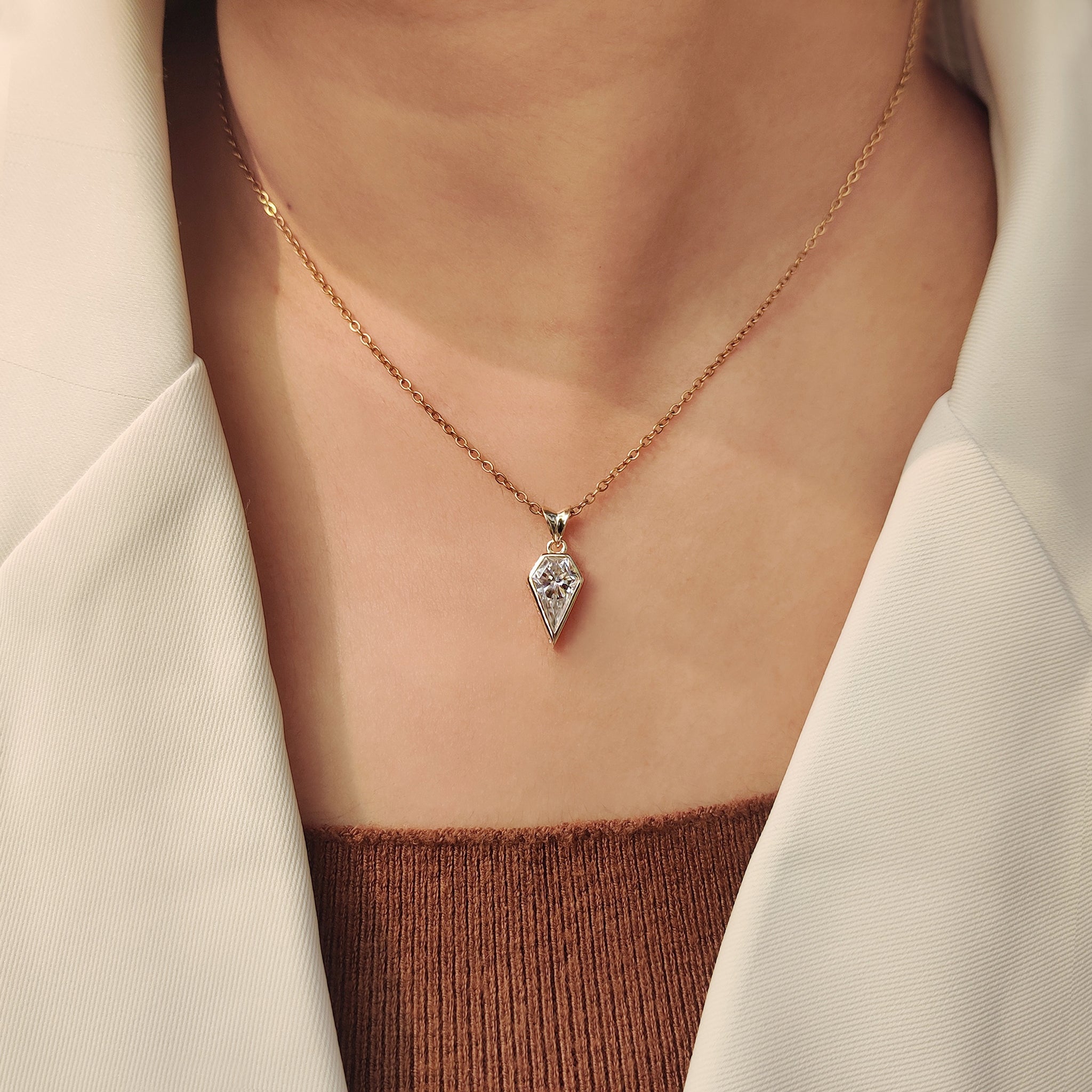 Carat Diamonds spear cut moissanite solitaire pendant.
