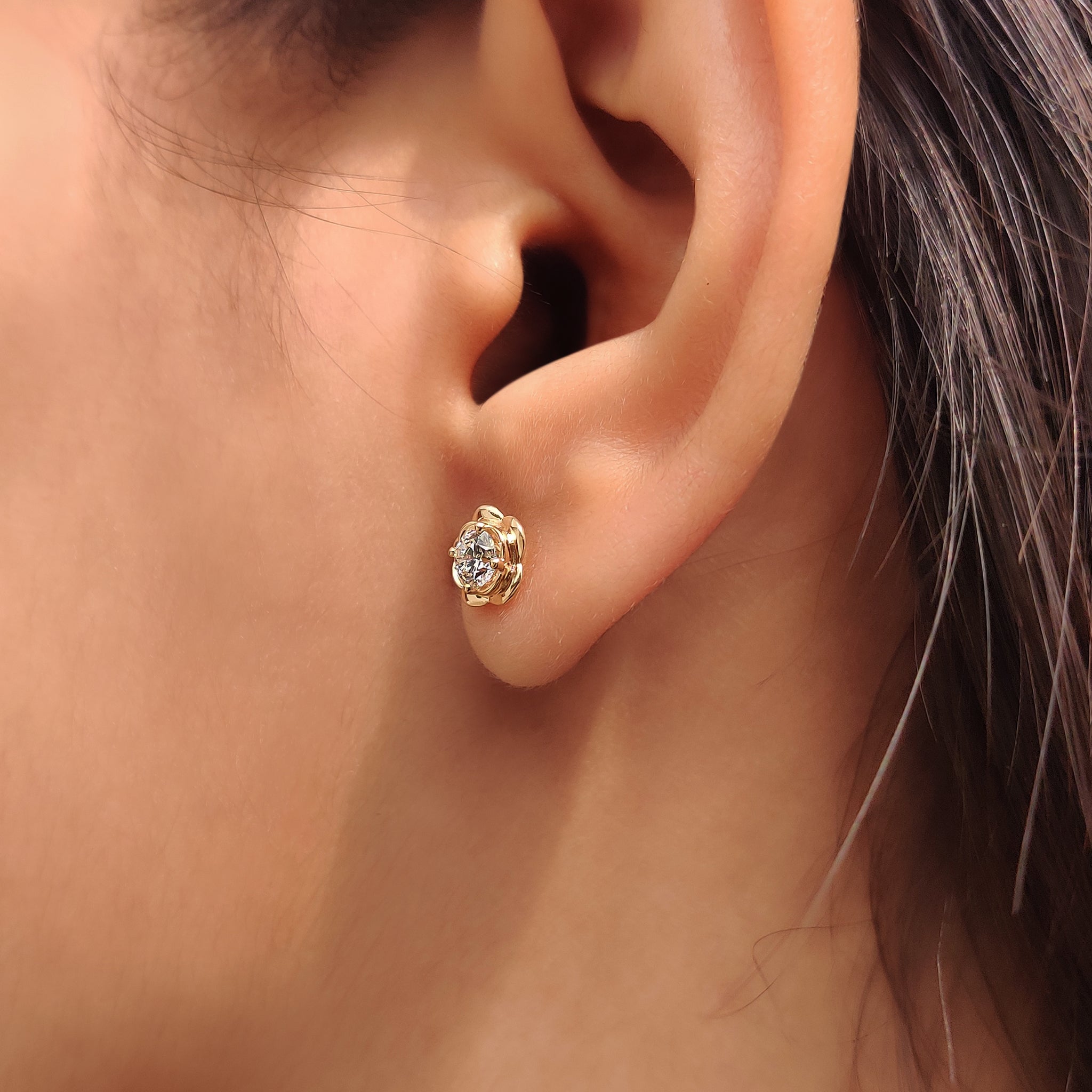 Handmade flower shaped diamond earrings studs.
