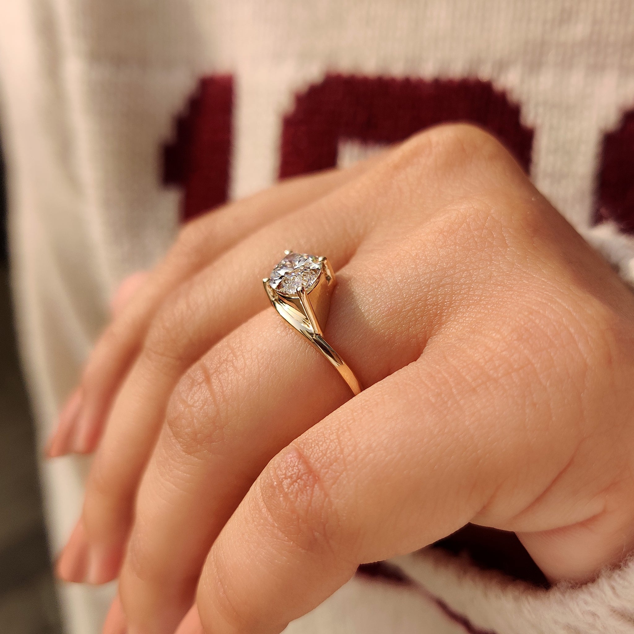 Handmade marquise diamond solitaire ring with bypass setting Carat Diamonds.
