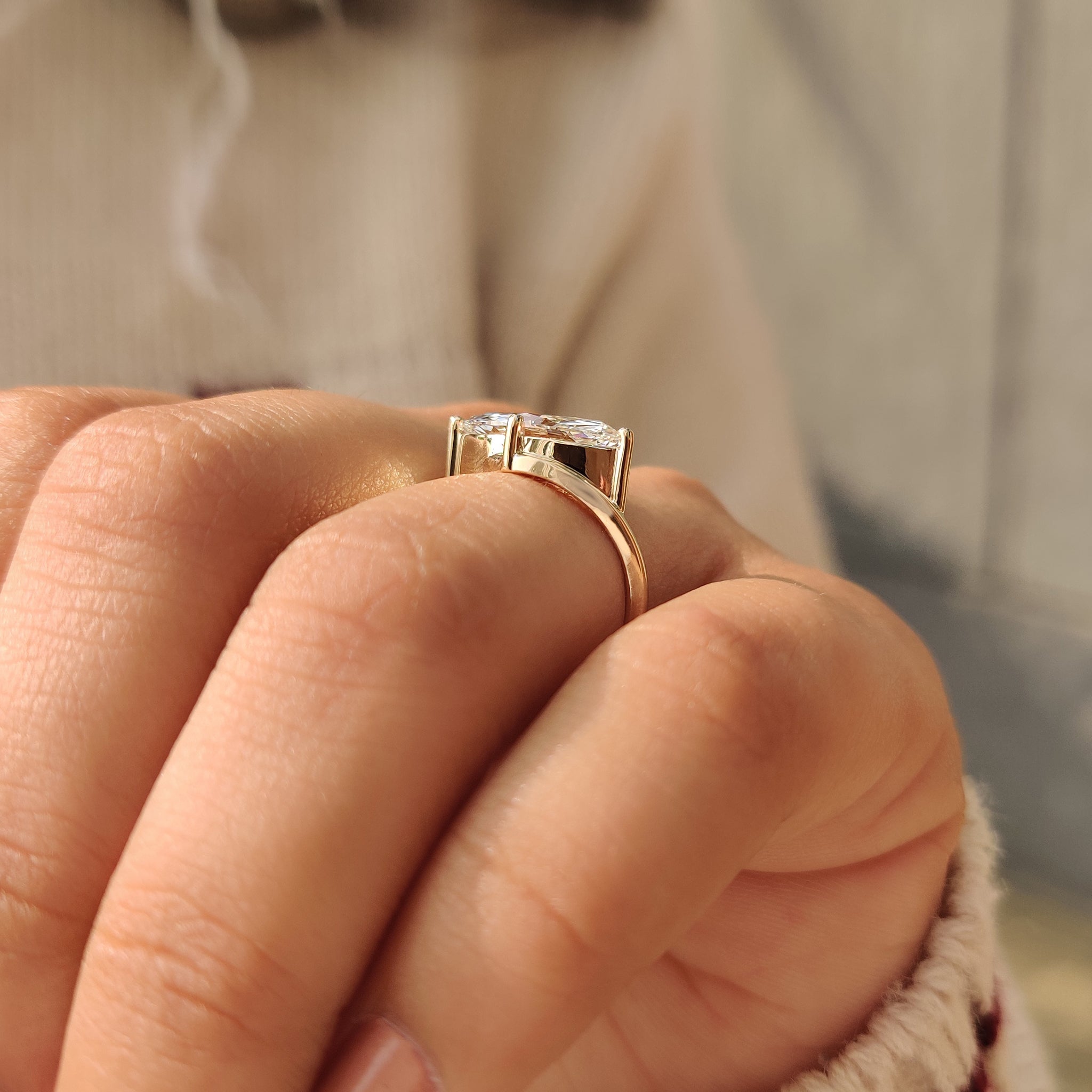 IGI certified solitaire ring with marquise diamond and 4 prong setting.
