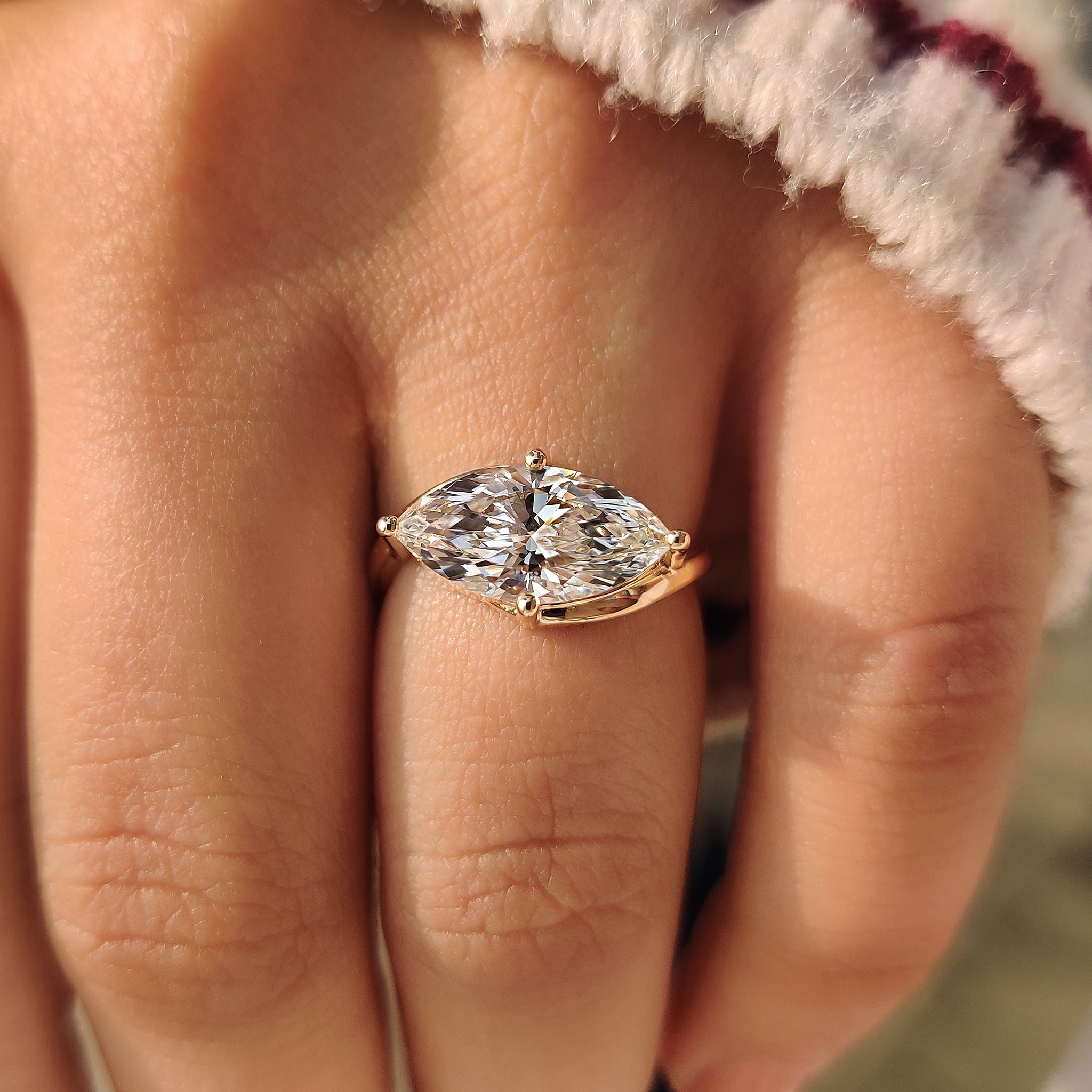 Marquise diamond solitaire ring with 4 prong setting and lab grown diamond.
