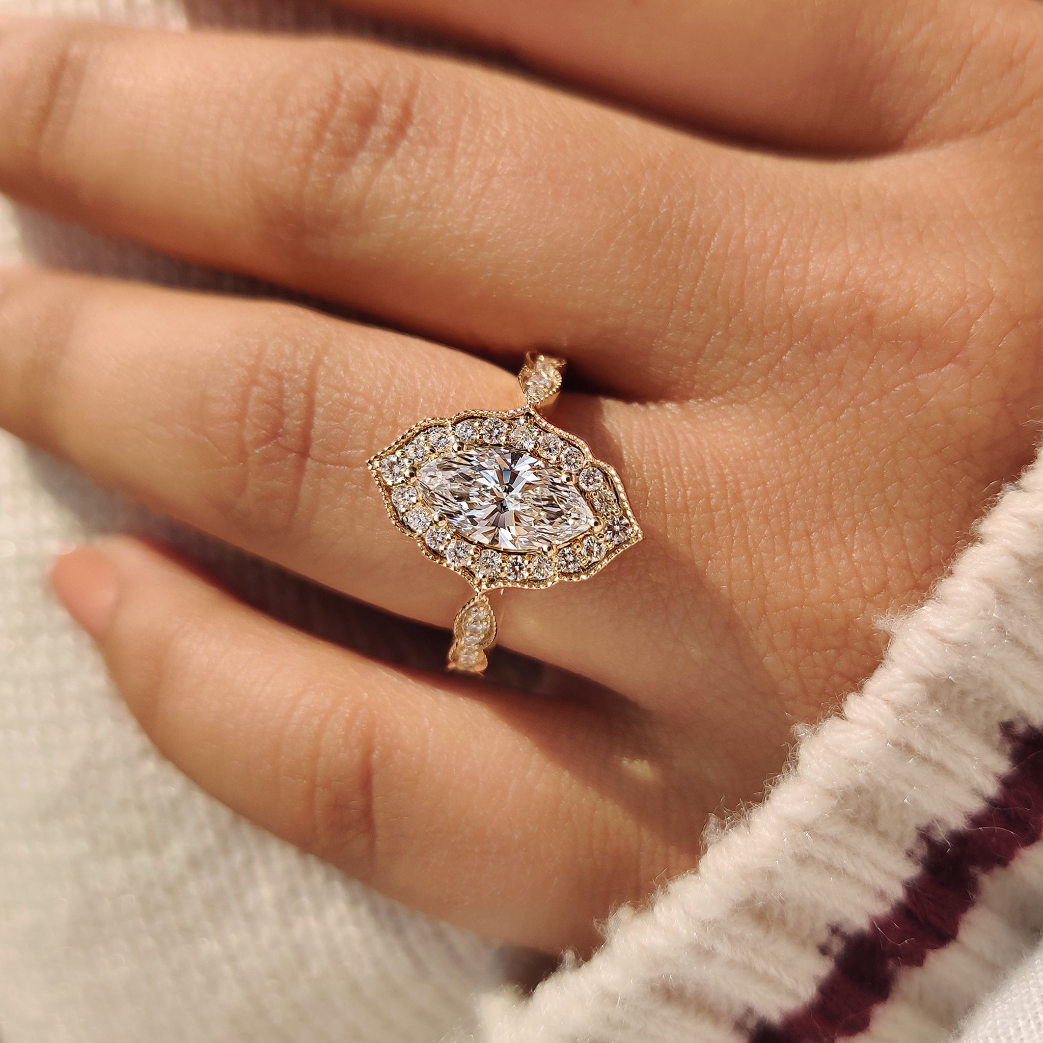 Carat Diamonds marquise cut diamond ring vintage style.
