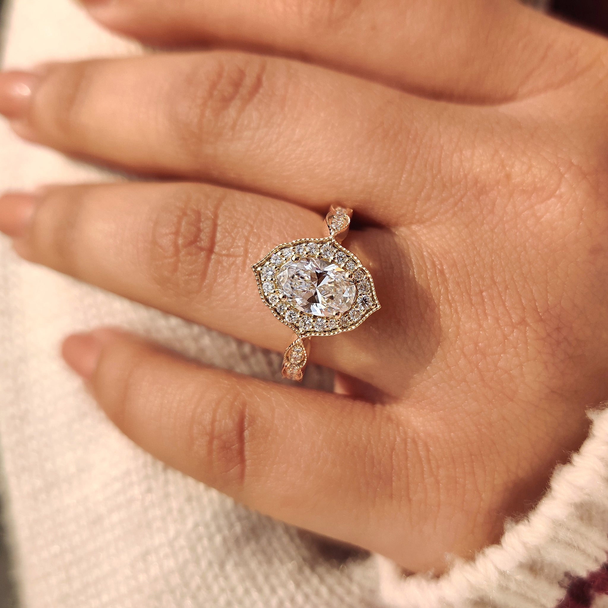 Carat Diamonds oval cut diamond ring vintage style.
