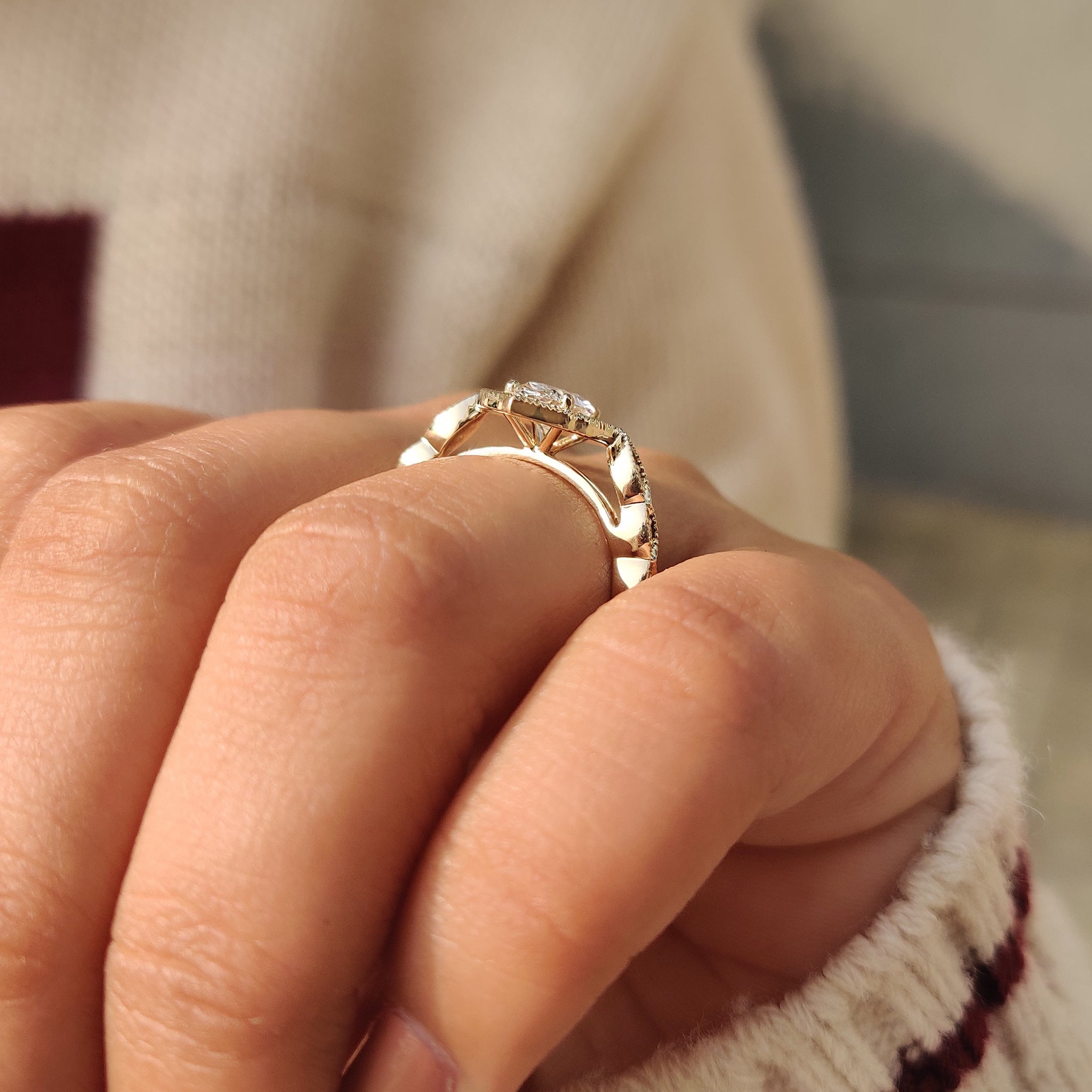 Vintage style oval cut diamond ring with halo.
