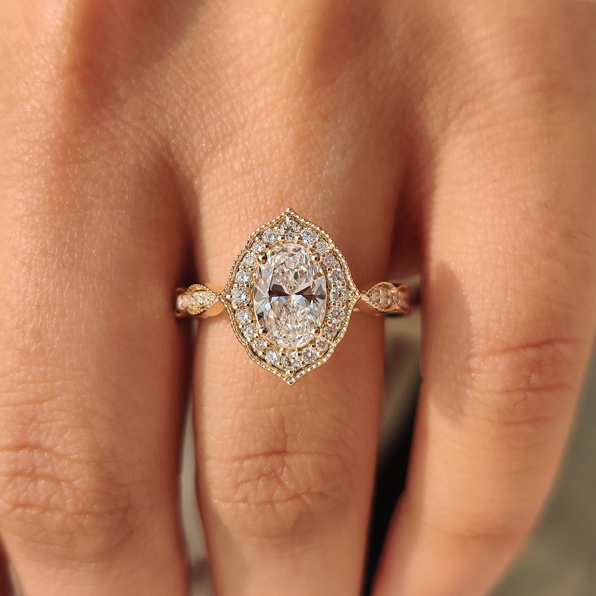 Oval diamond ring with four prong setting.
