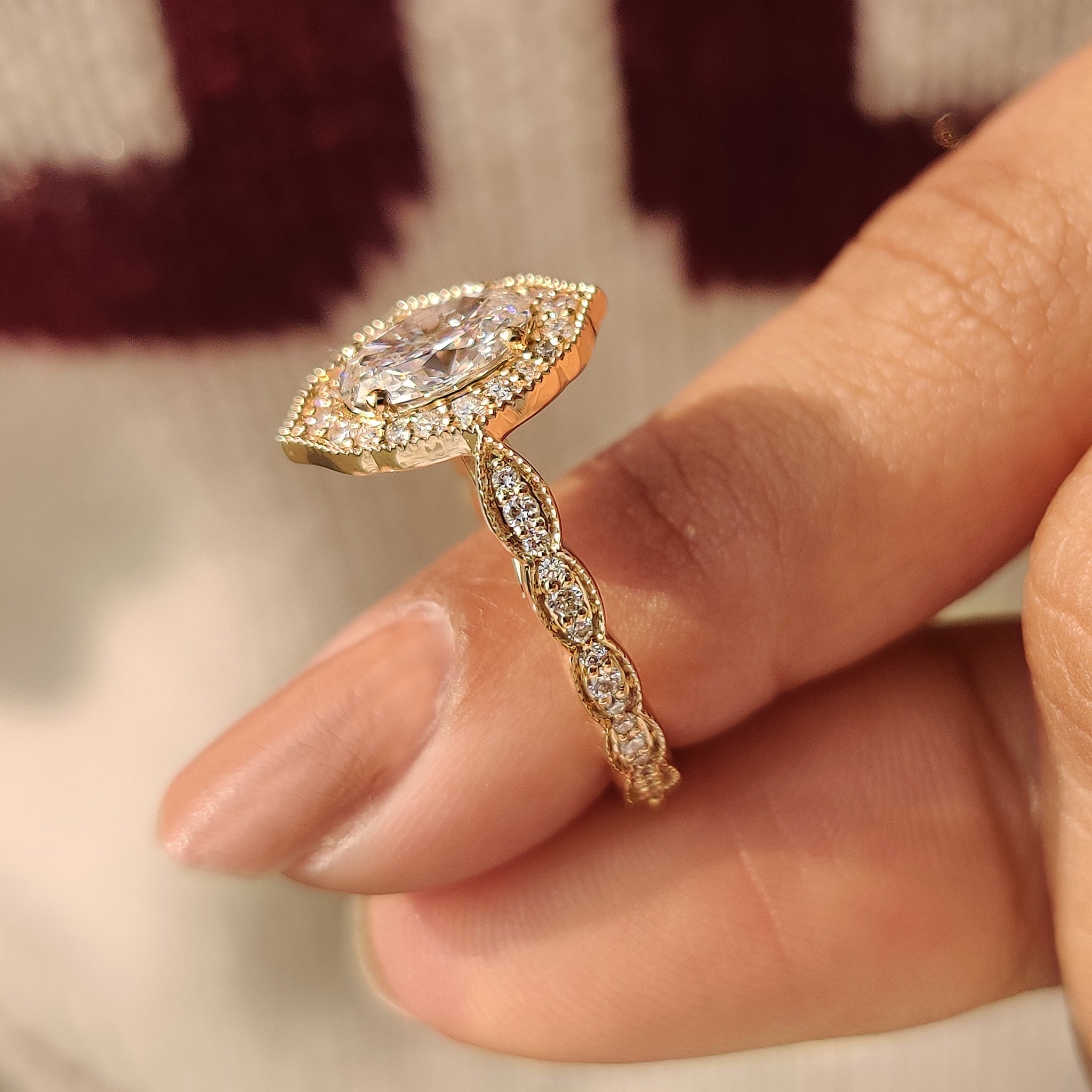 Handmade oval cut diamond ring with milgrain setting.
