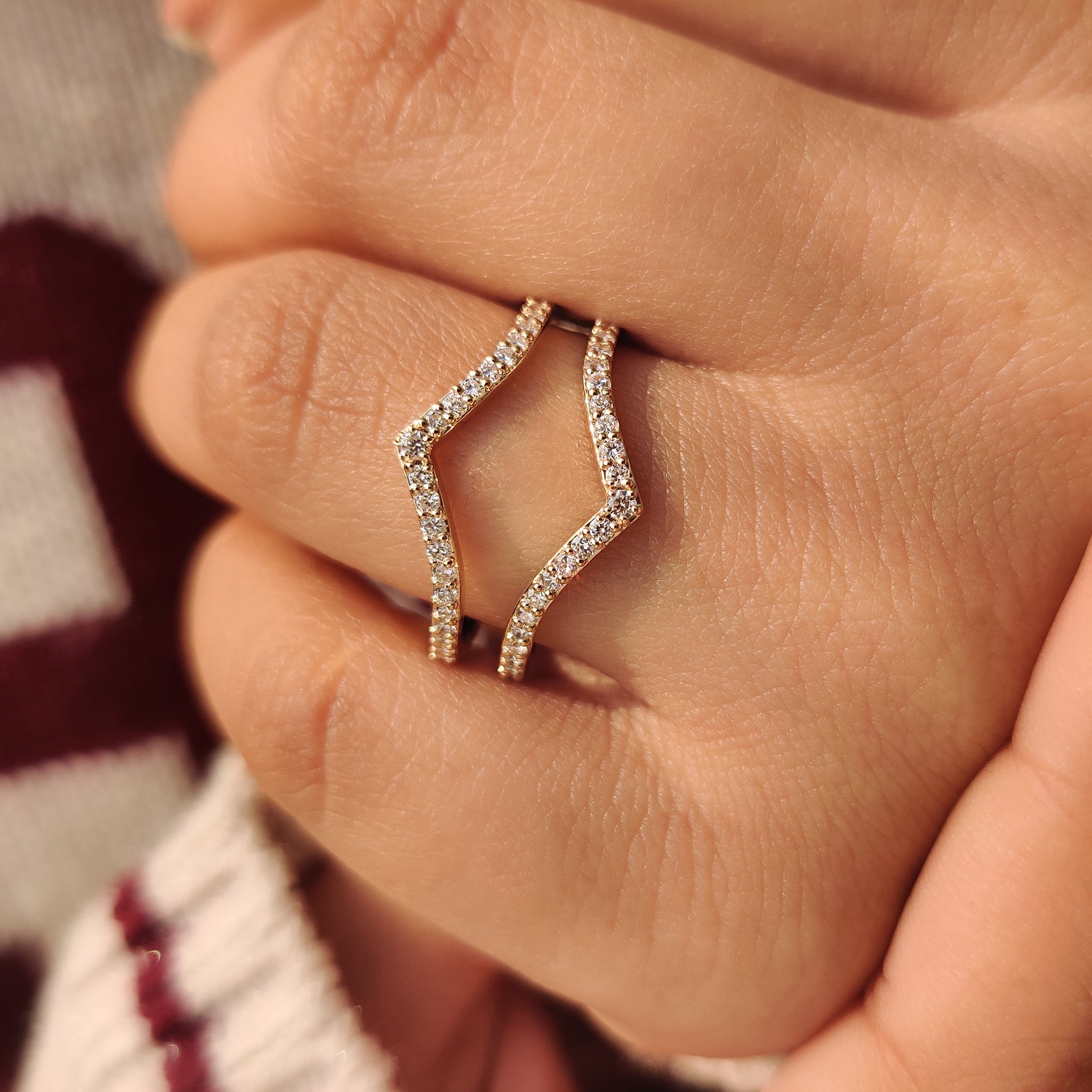 Handmade round diamond V shaped wedding band.
