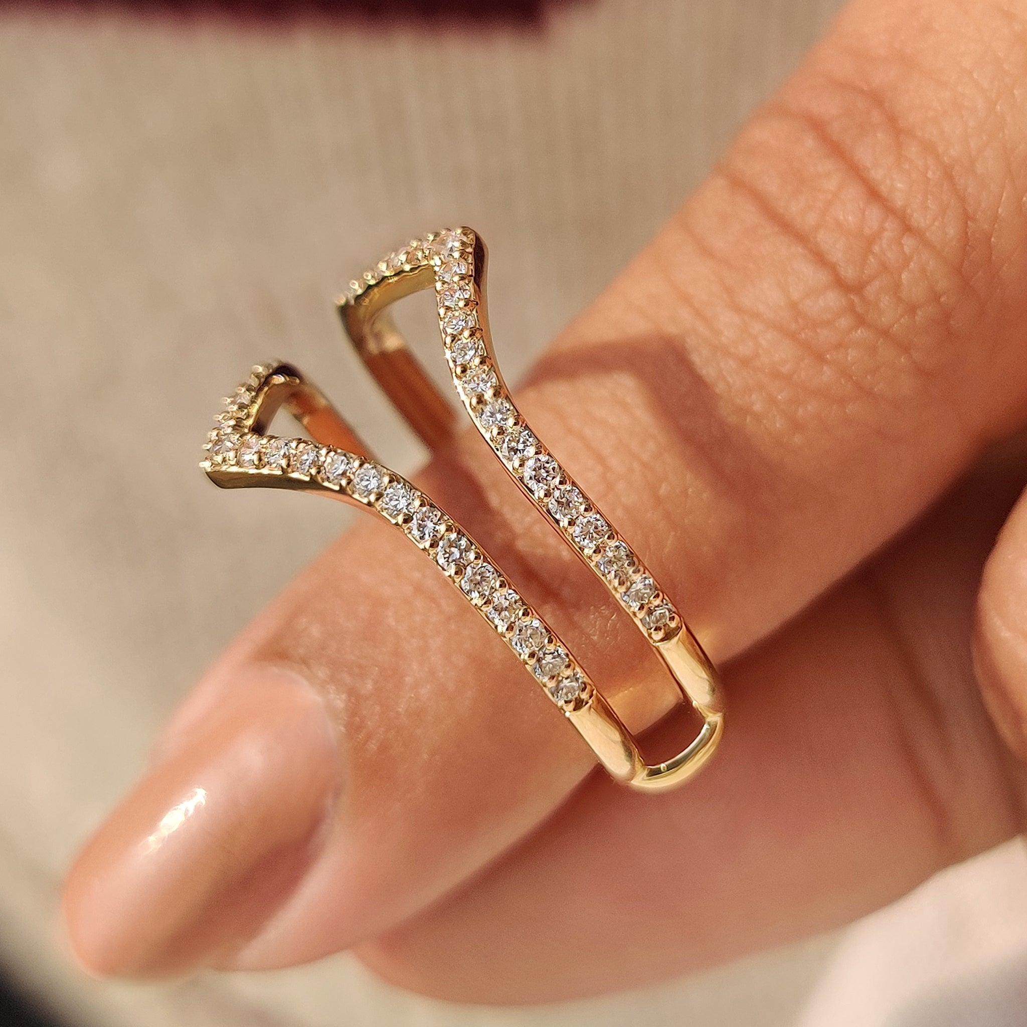 V shaped wedding band with wrap guard style.
