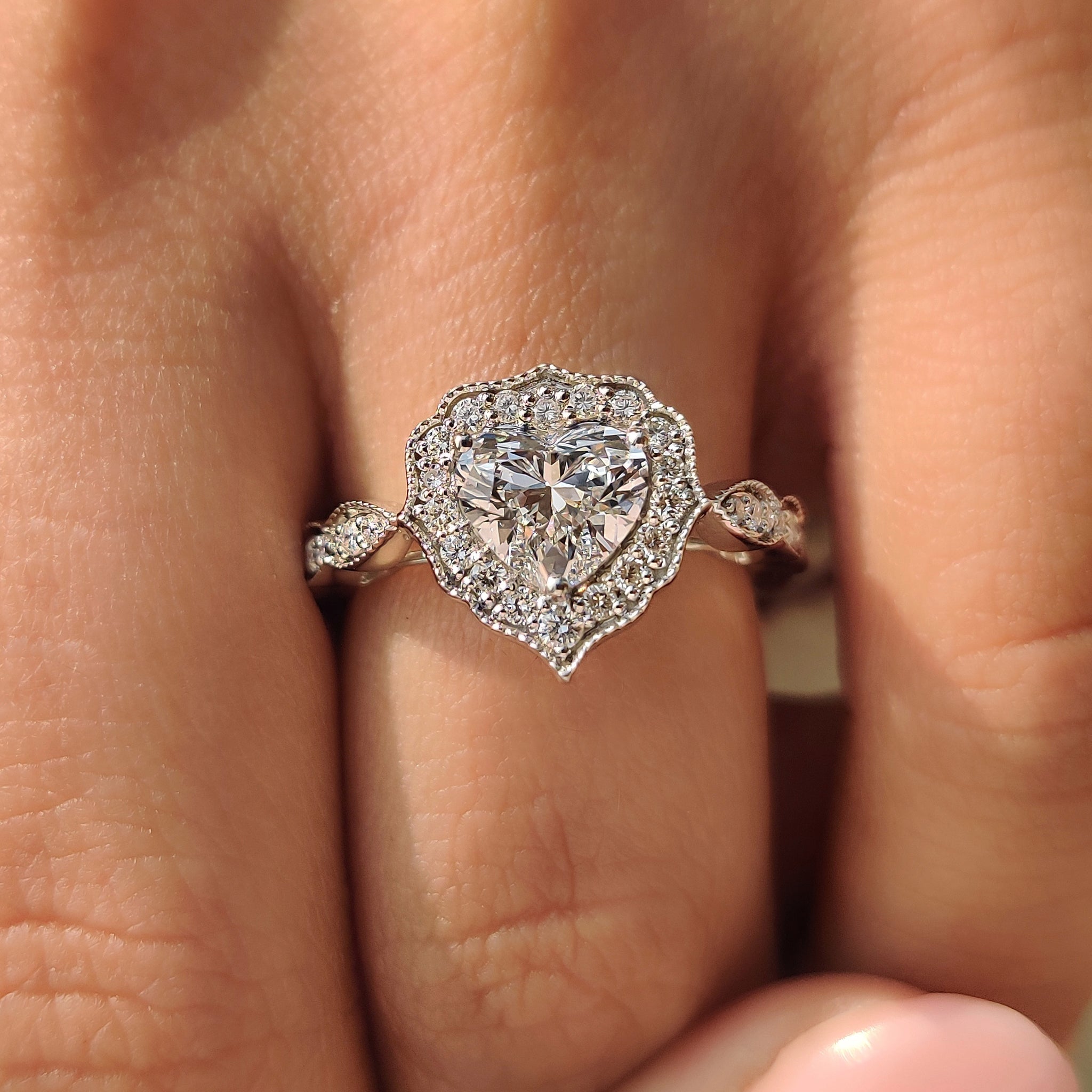 Heart cut diamond ring with three prong setting.
