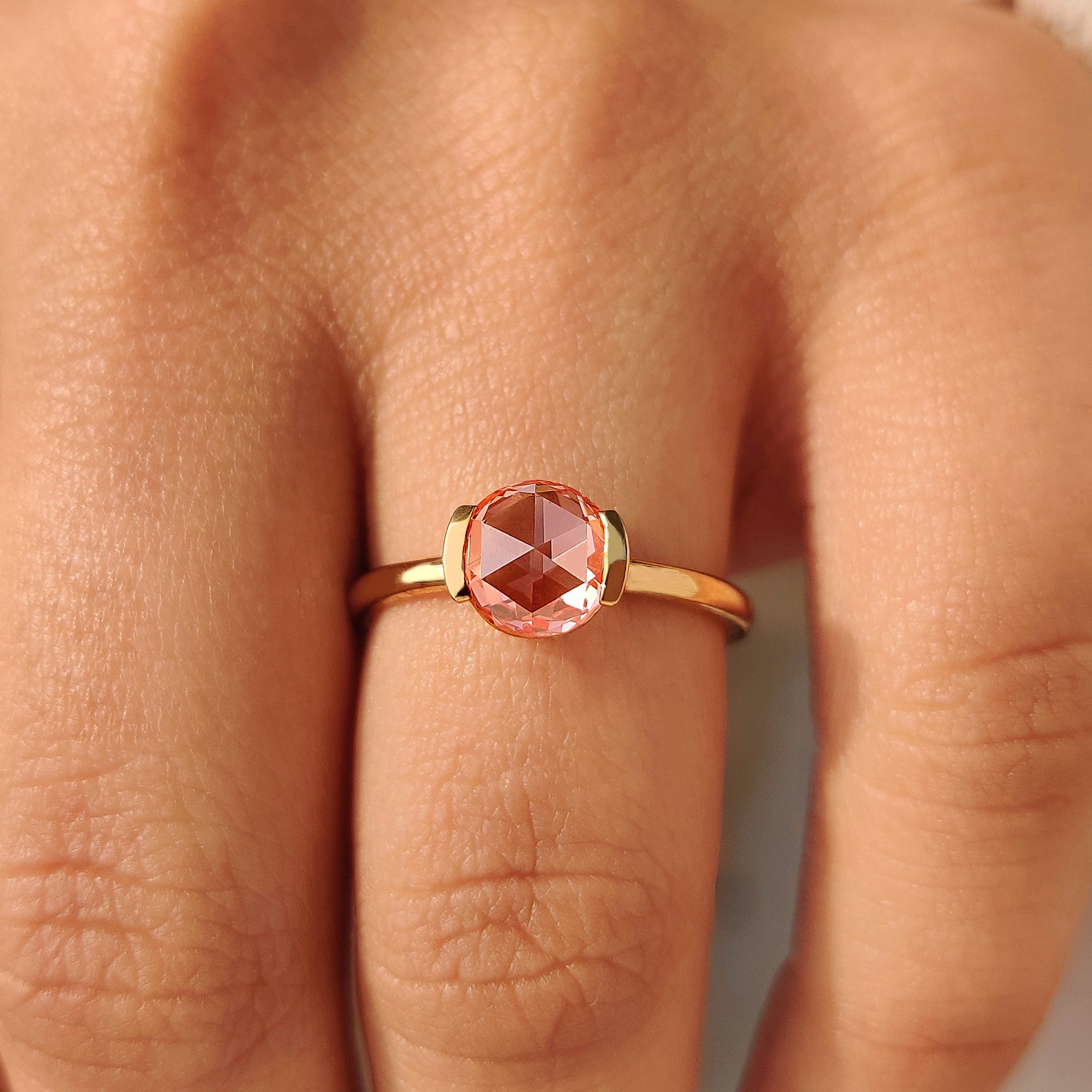 Lab grown pink diamond solitaire engagement ring.
