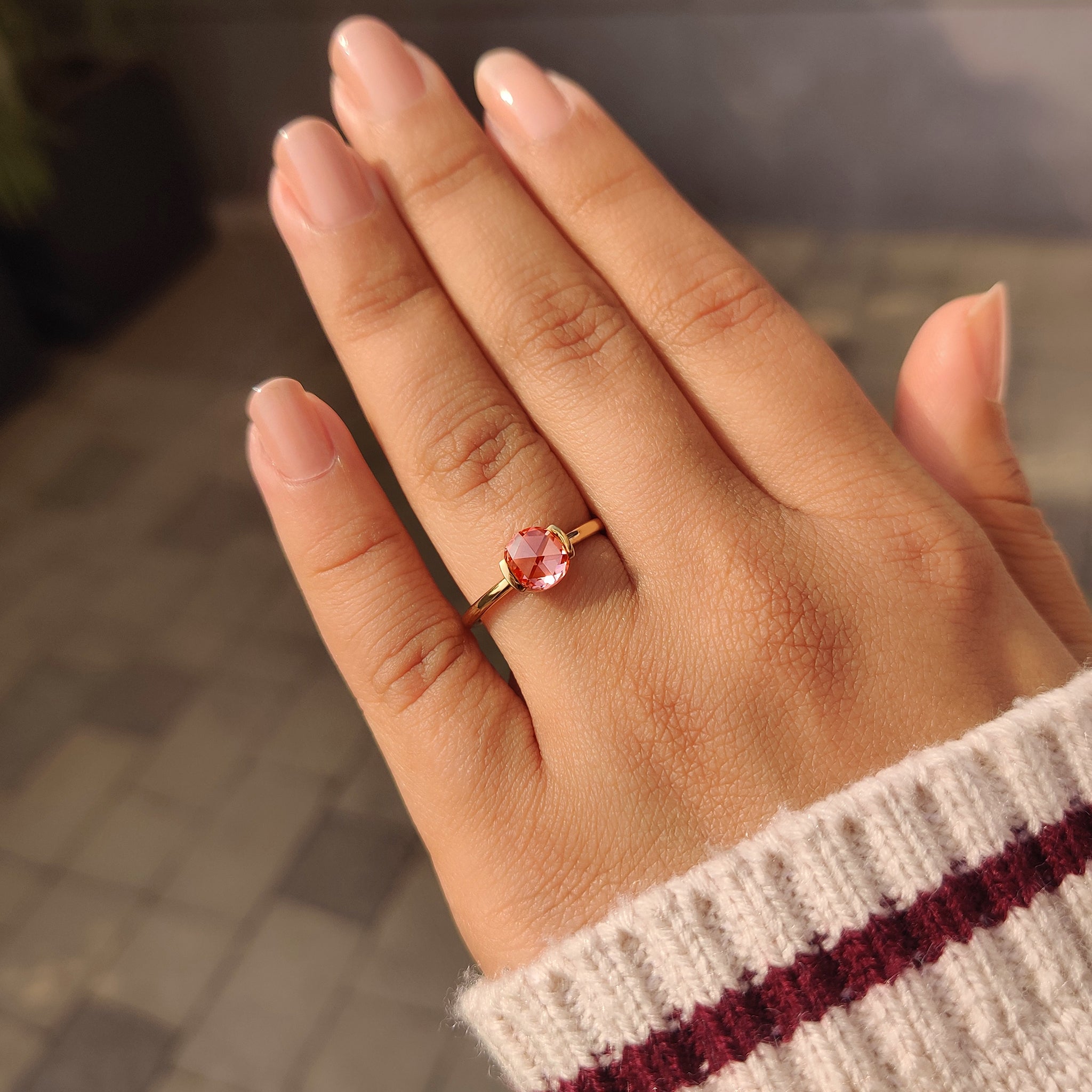 Handmade solitaire ring with round rose cut pink diamond.
