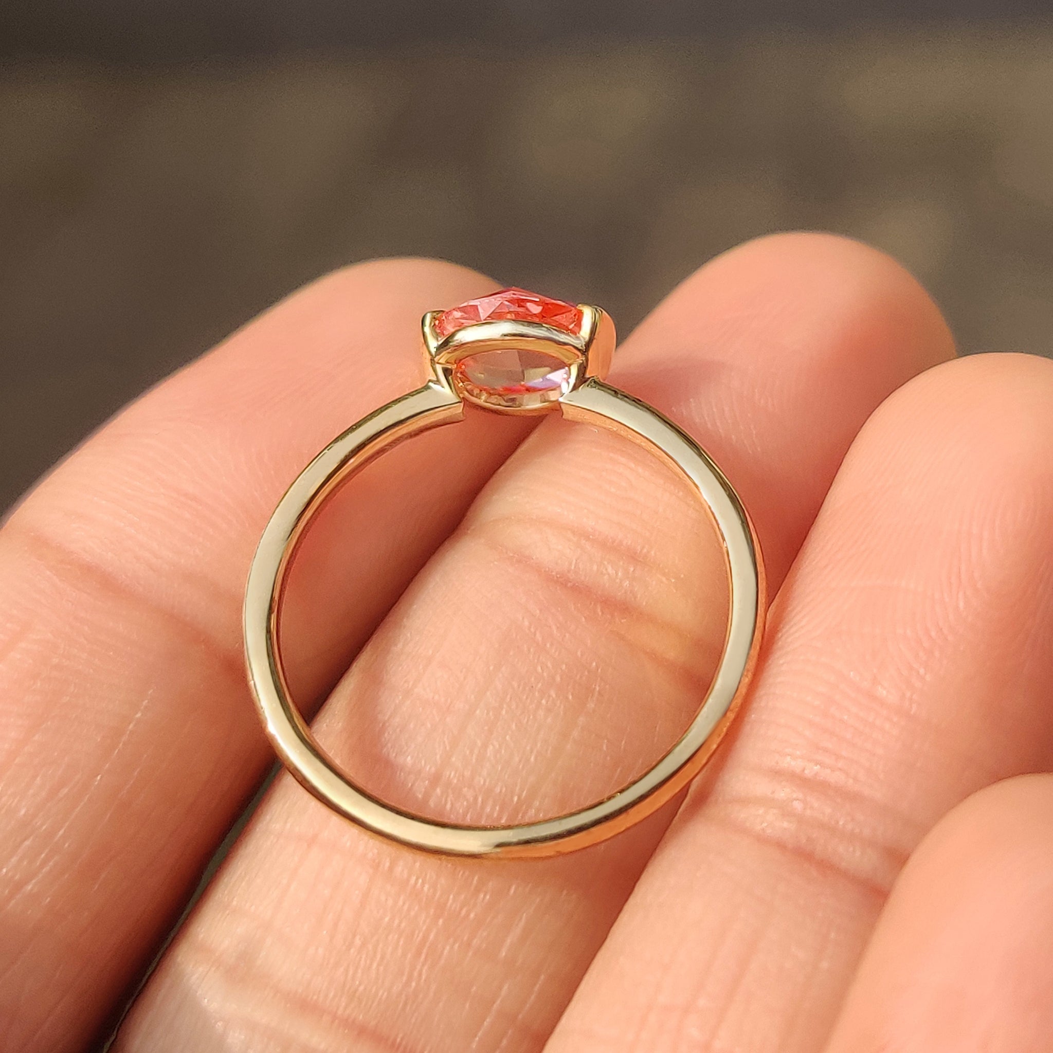 Carat Diamonds pink diamond solitaire engagement ring.
