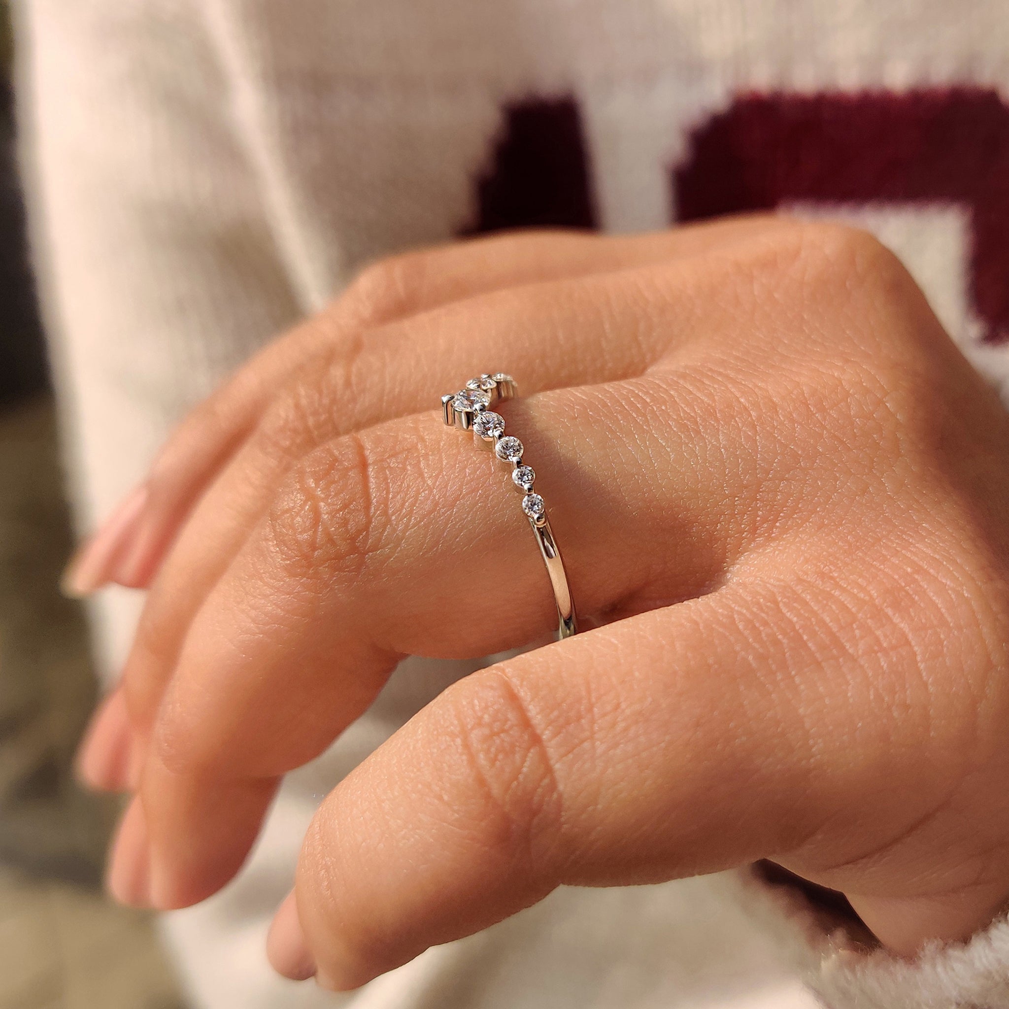 Lab grown diamond curved wedding band.
