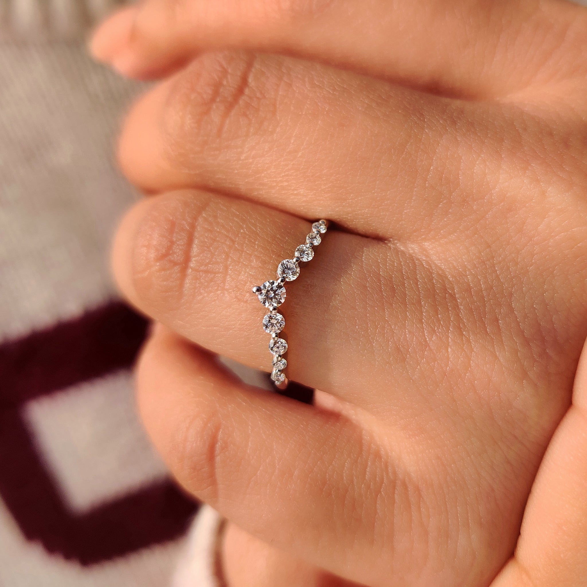 Handmade lab grown diamond curved band.
