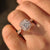 Halo setting vintage diamond engagement ring.
