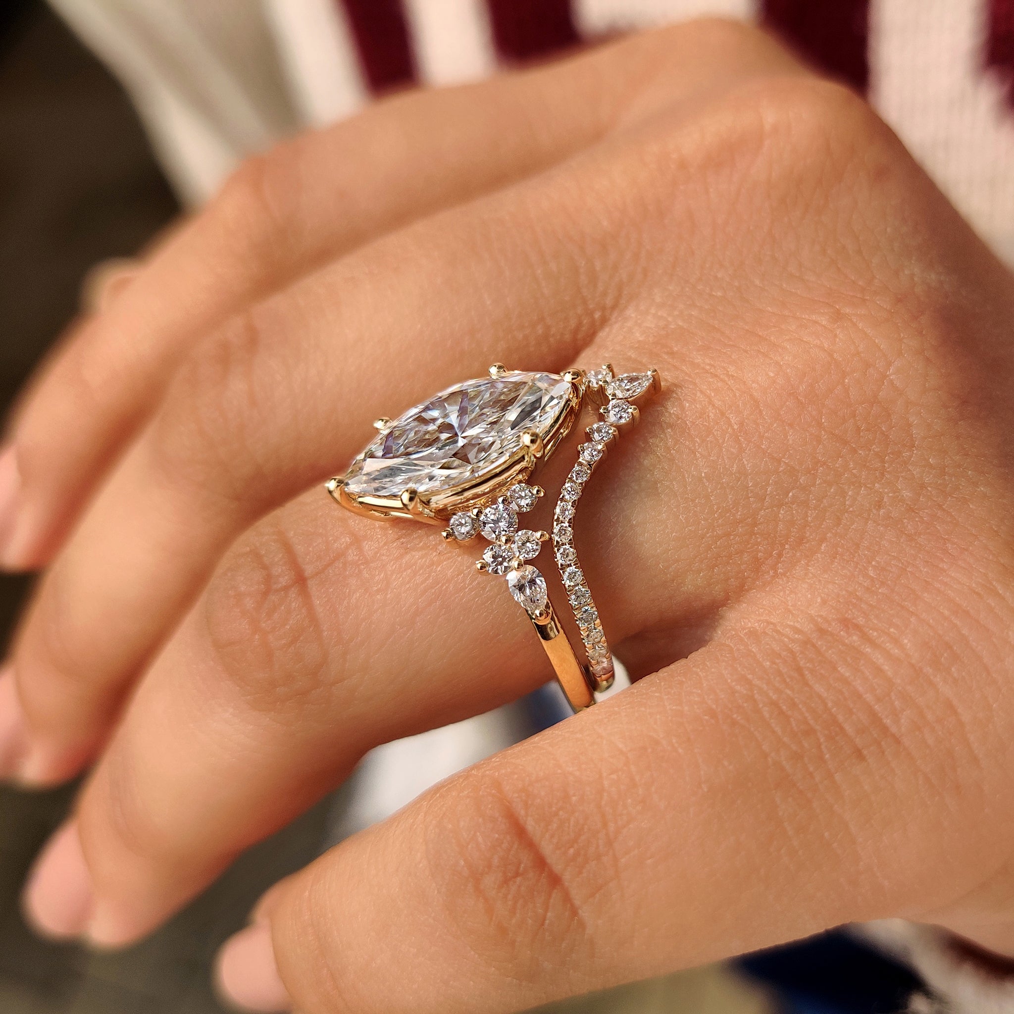 Half eternity chevron wedding band with marquise ring.
