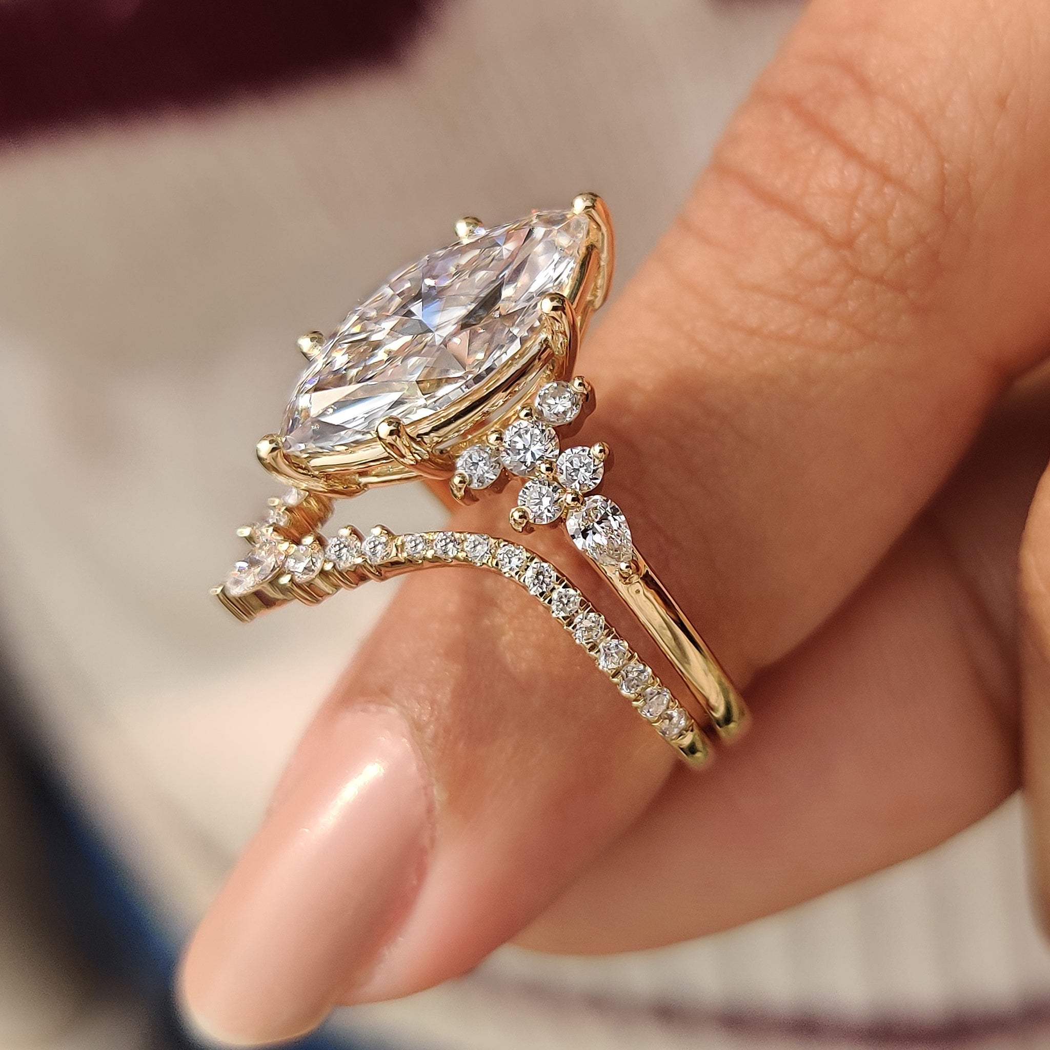 Lab grown marquise ring with matching wedding band set.

