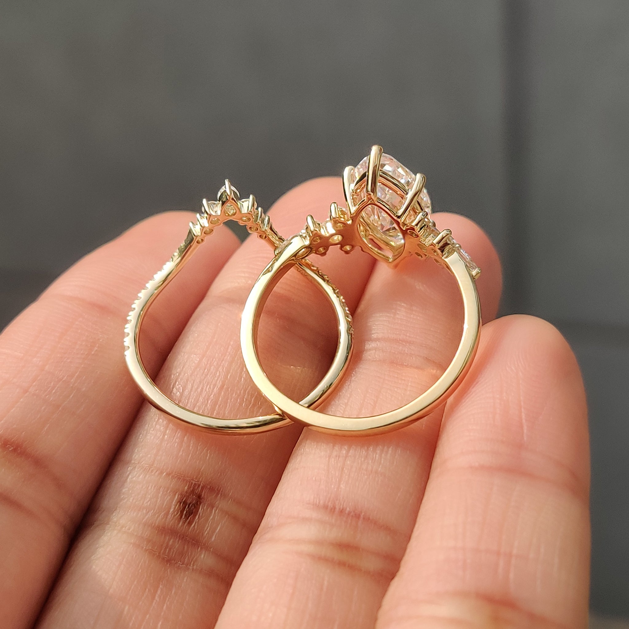 Marquise cut ring with cluster side stone setting.
