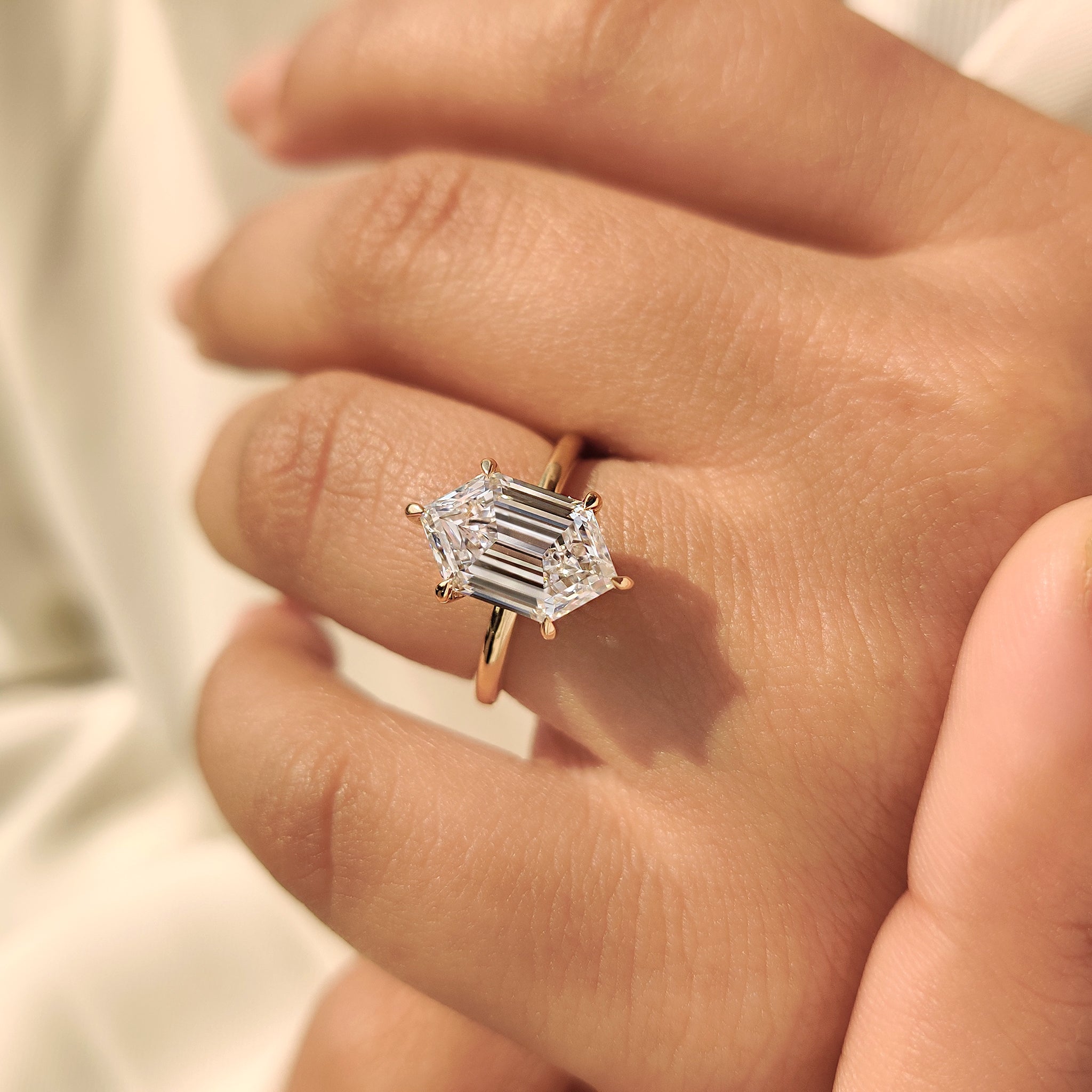 Carat Diamonds solitaire diamond ring with modern shape
