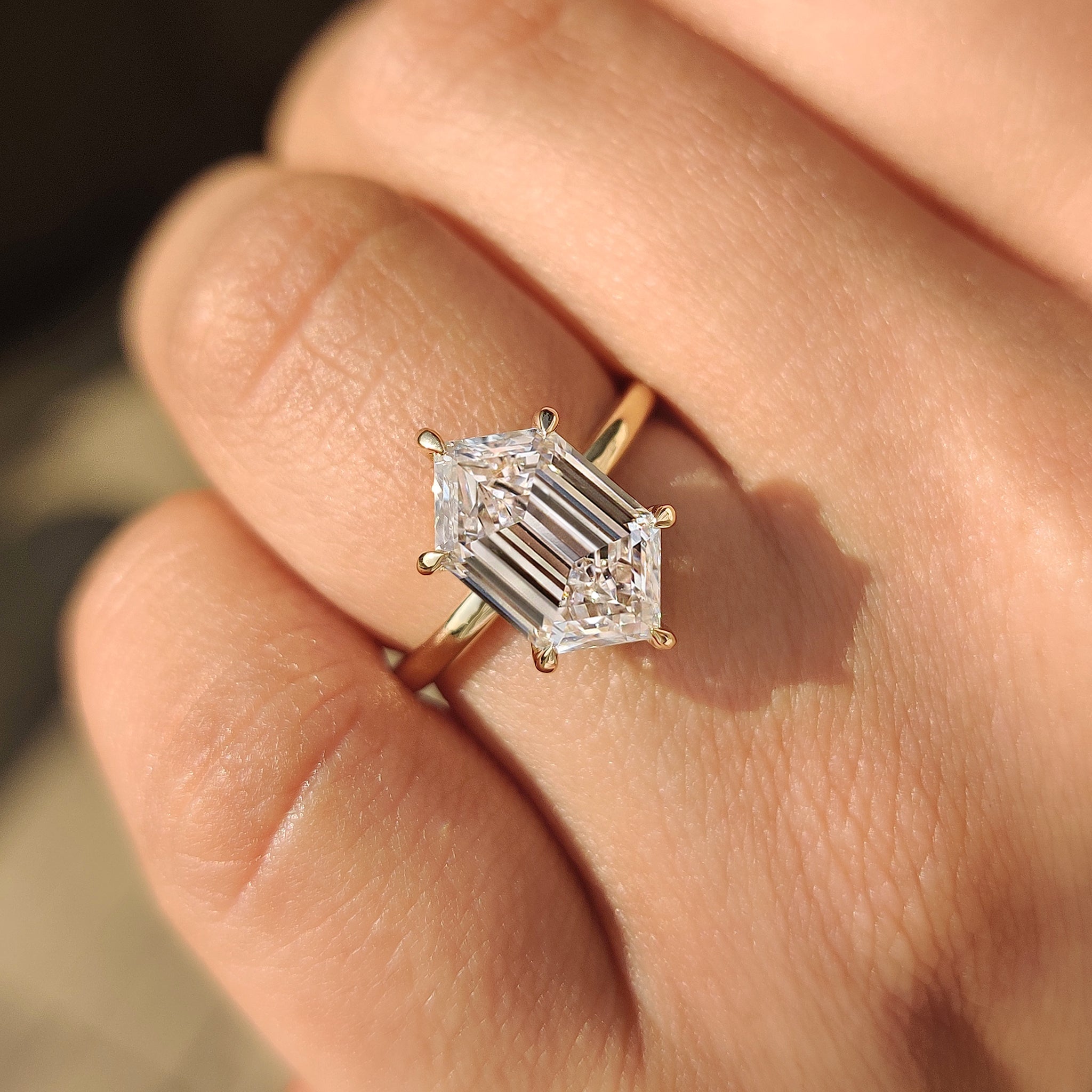 Lab grown hexagon step cut solitaire diamond ring
