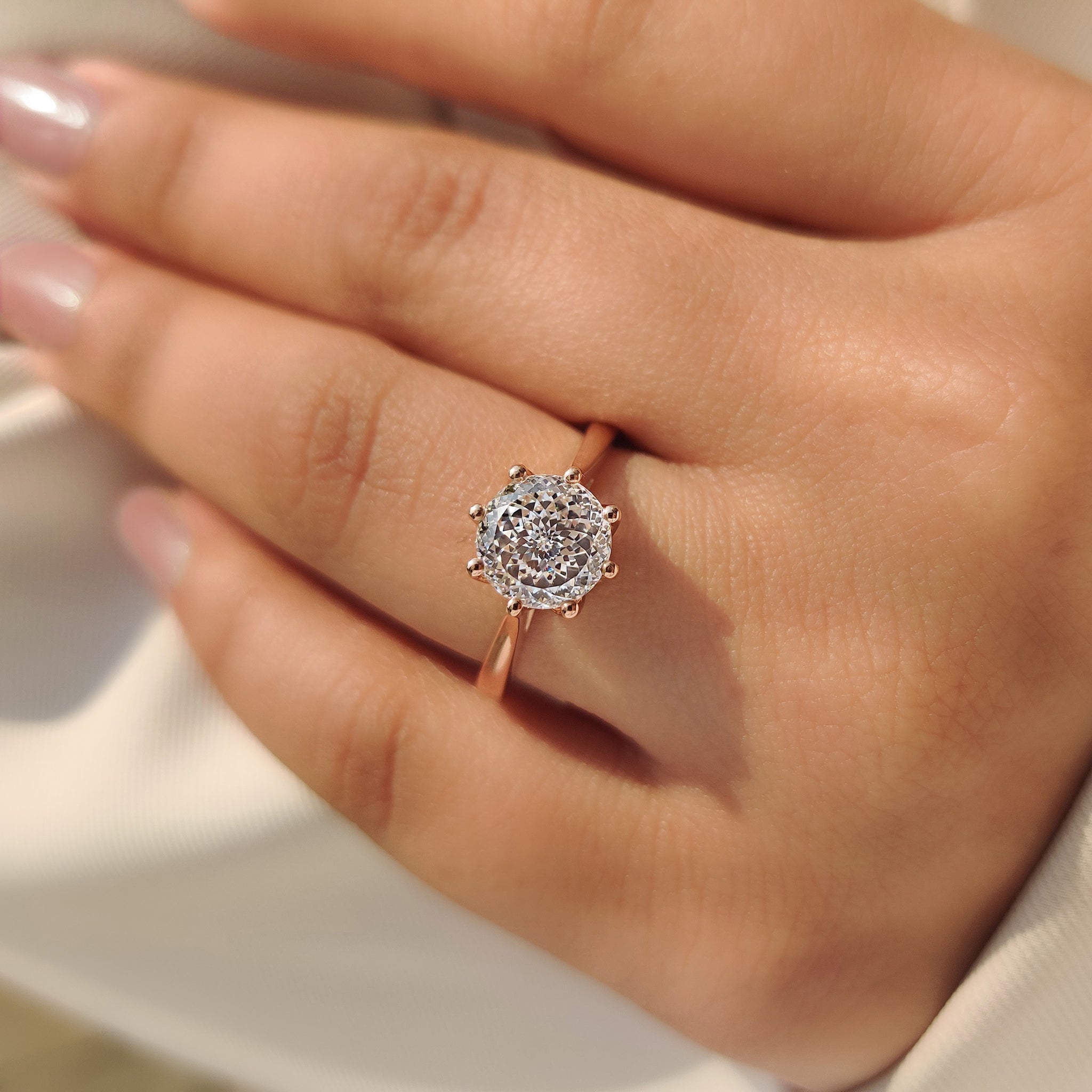 Portuguese cut diamond ring with elegant tulip setting
