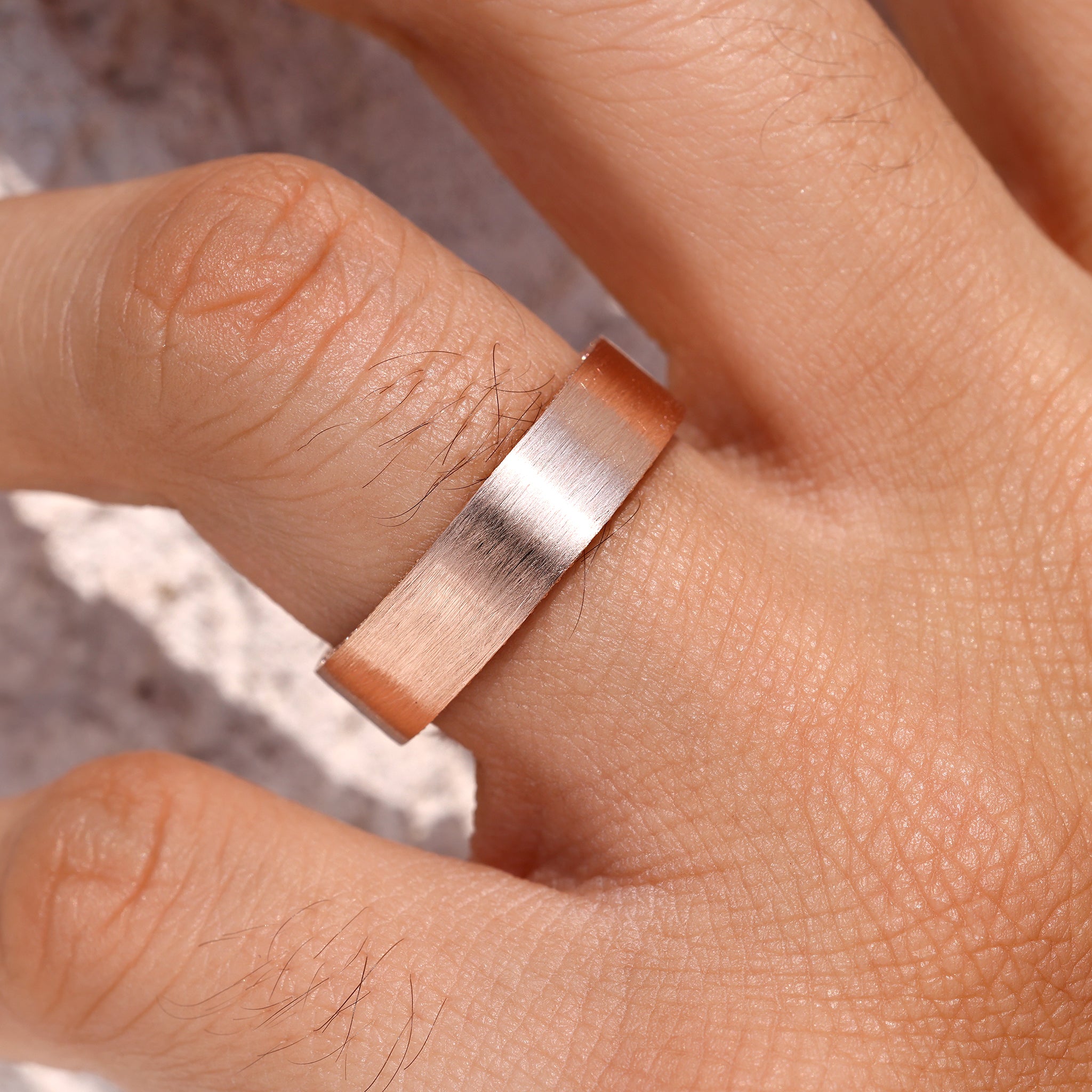 Men’s double side eternity ring with round cut stones.
