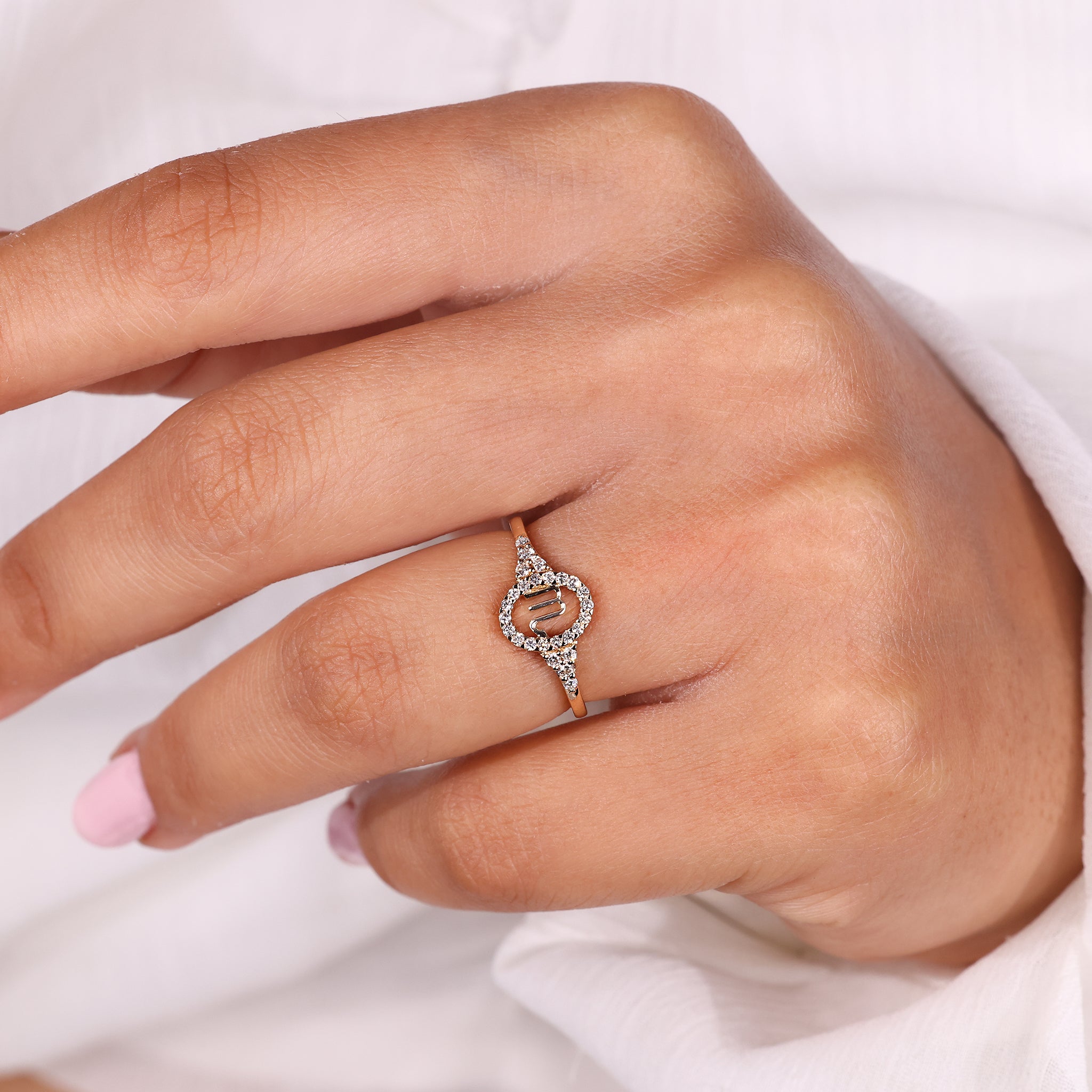 Buy engagement ring with Scorpio zodiac design and halo diamond setting.
