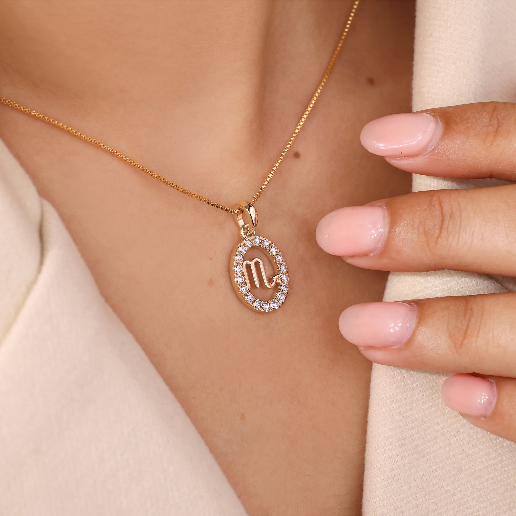 Astrology pendant featuring Scorpio constellation design in yellow gold finish.