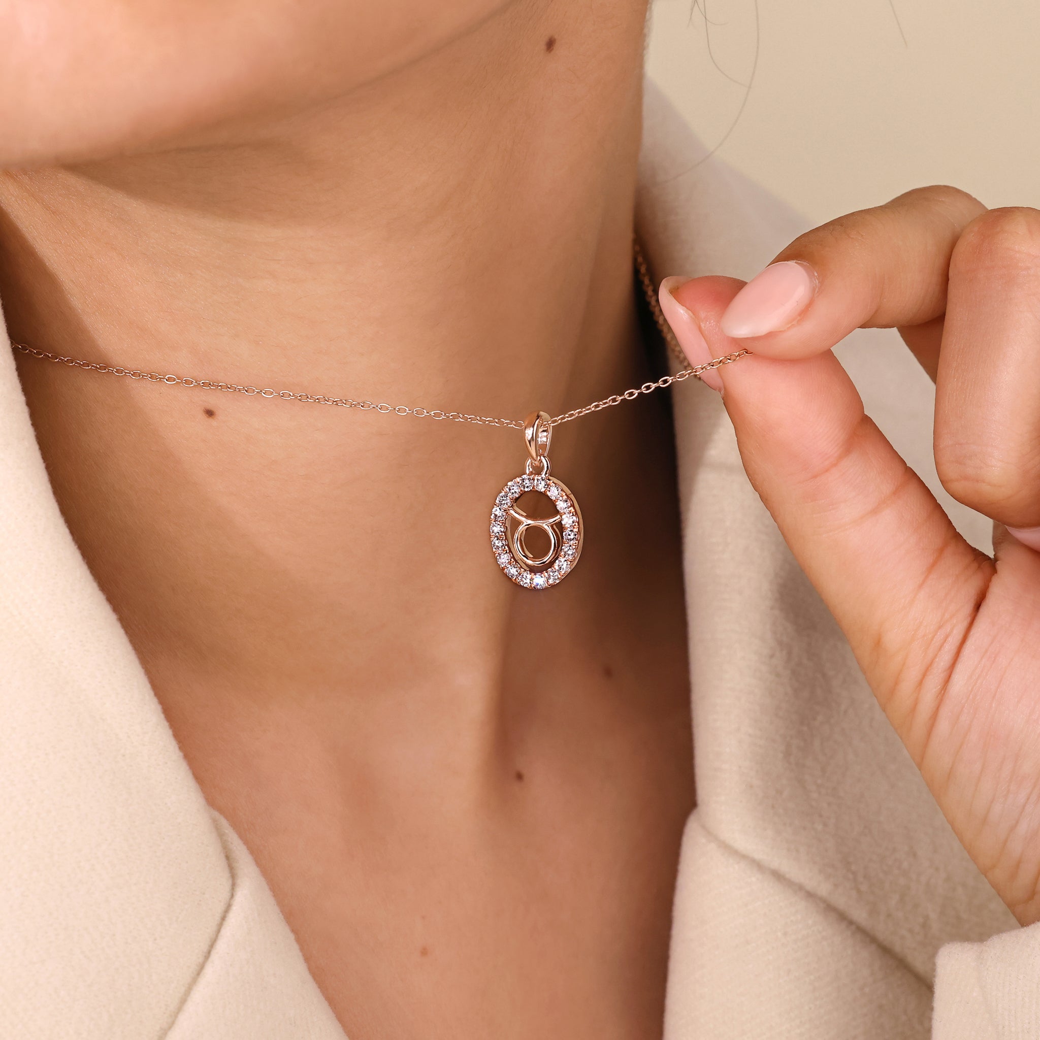 Buy Taurus pendant with halo diamond and zodiac gold detailing.