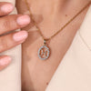 Halo diamond Pisces pendant showcasing horoscope design in gold.