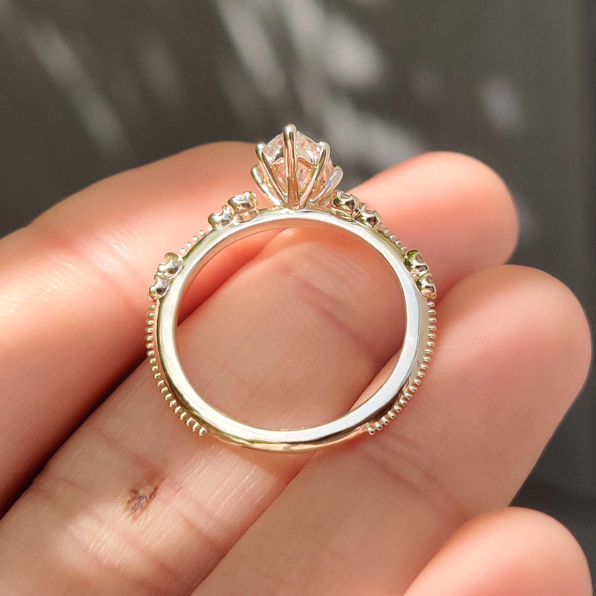 Vintage marquise ring with muse setting and fine milgrain.
