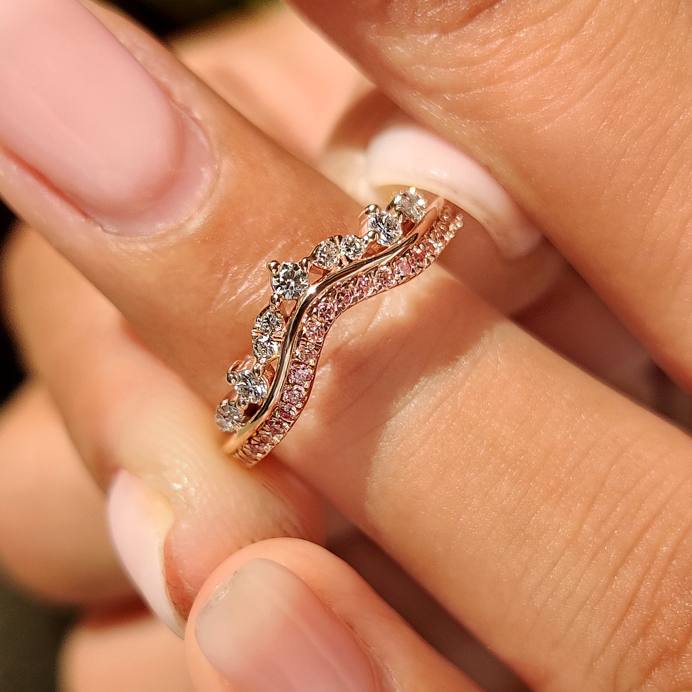 Tiara wedding ring with round diamonds and shared prongs

