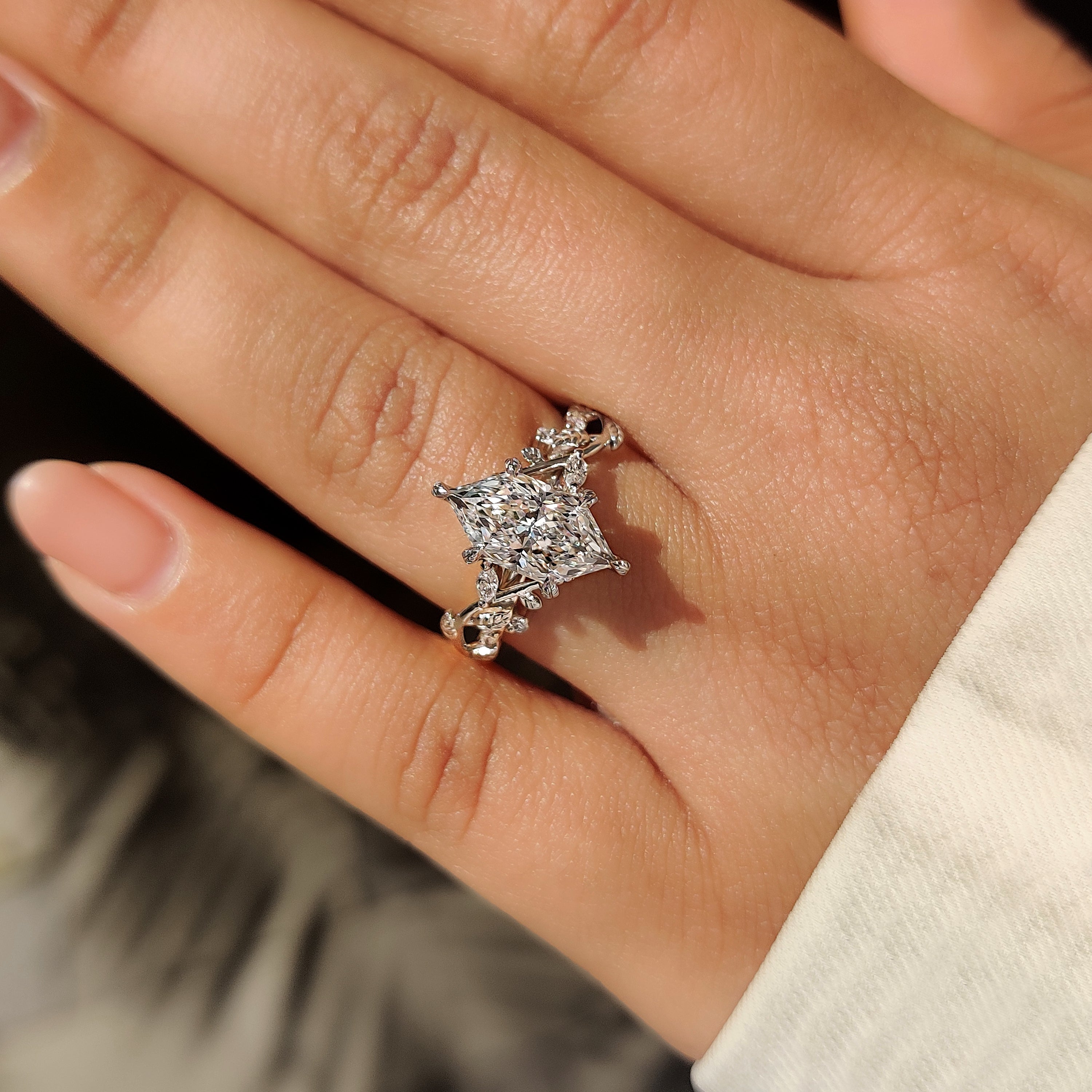 Marquise diamond engagement ring with nature inspired style.
